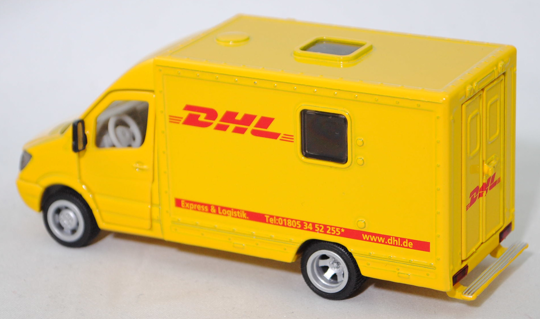 00000 Mercedes-Benz Sprinter II (2. Generation, W 906, Typ Standard, Vor-MoPf, Modell 2006-2009) Postwagen, verkehrsgelb, DHL, Bpr. 2108 / 1936, SIKU SUPER 1:50, L17mpK