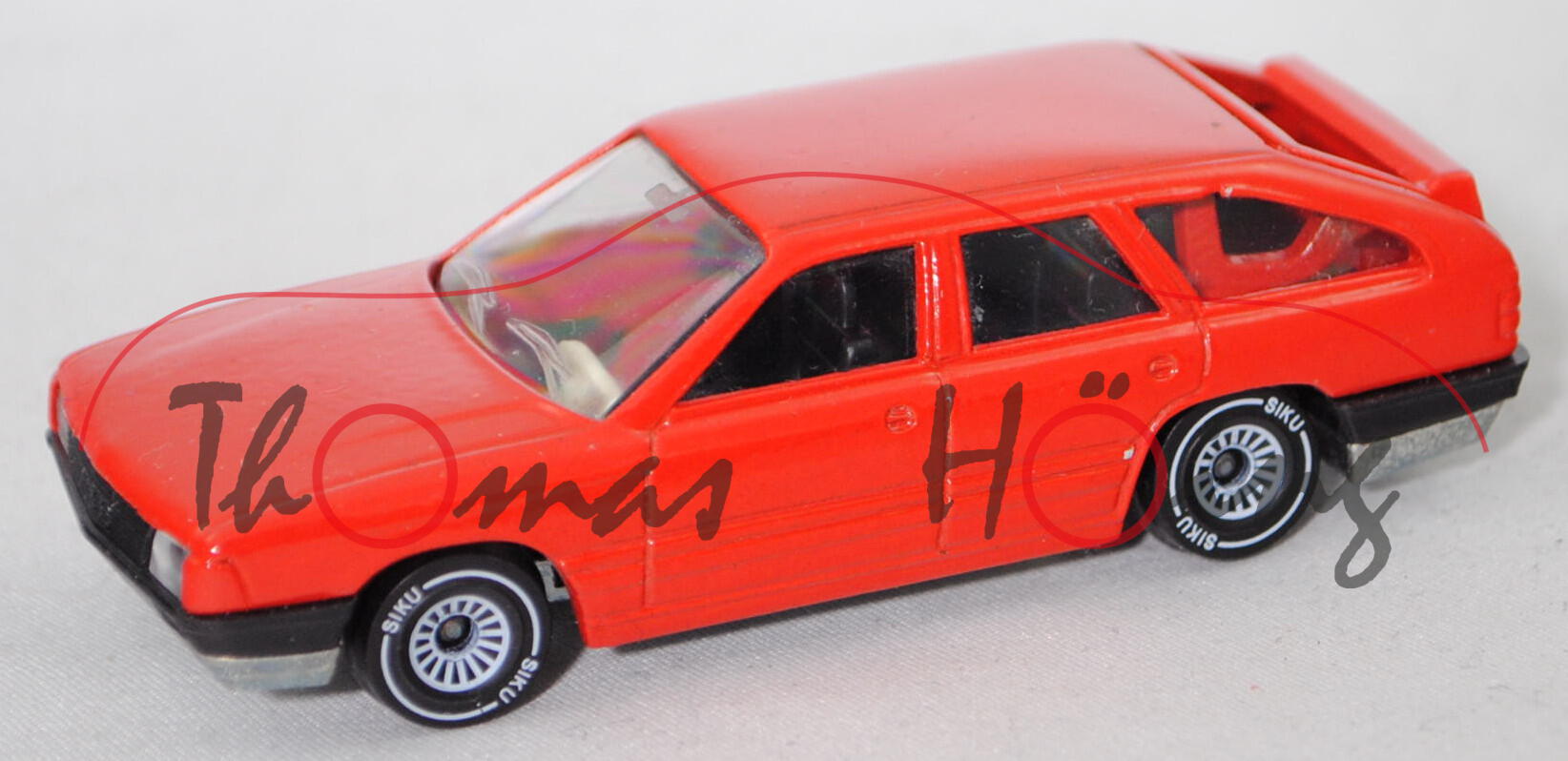 00003 Audi 100 Avant 2.1 (3. Gen., Baureihe C3, Typ 44, Mod. 1983-1984), verkehrsrot, SIKU, 1:56, m-