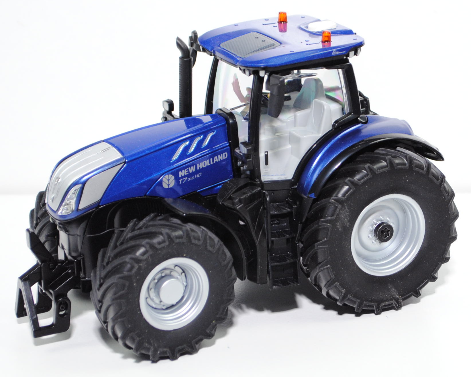 00000 New Holland T7.315 HD (Mod. 21-) mit Doppelreifen+Bluetooth App-Steuerung, 1:32, L18mp