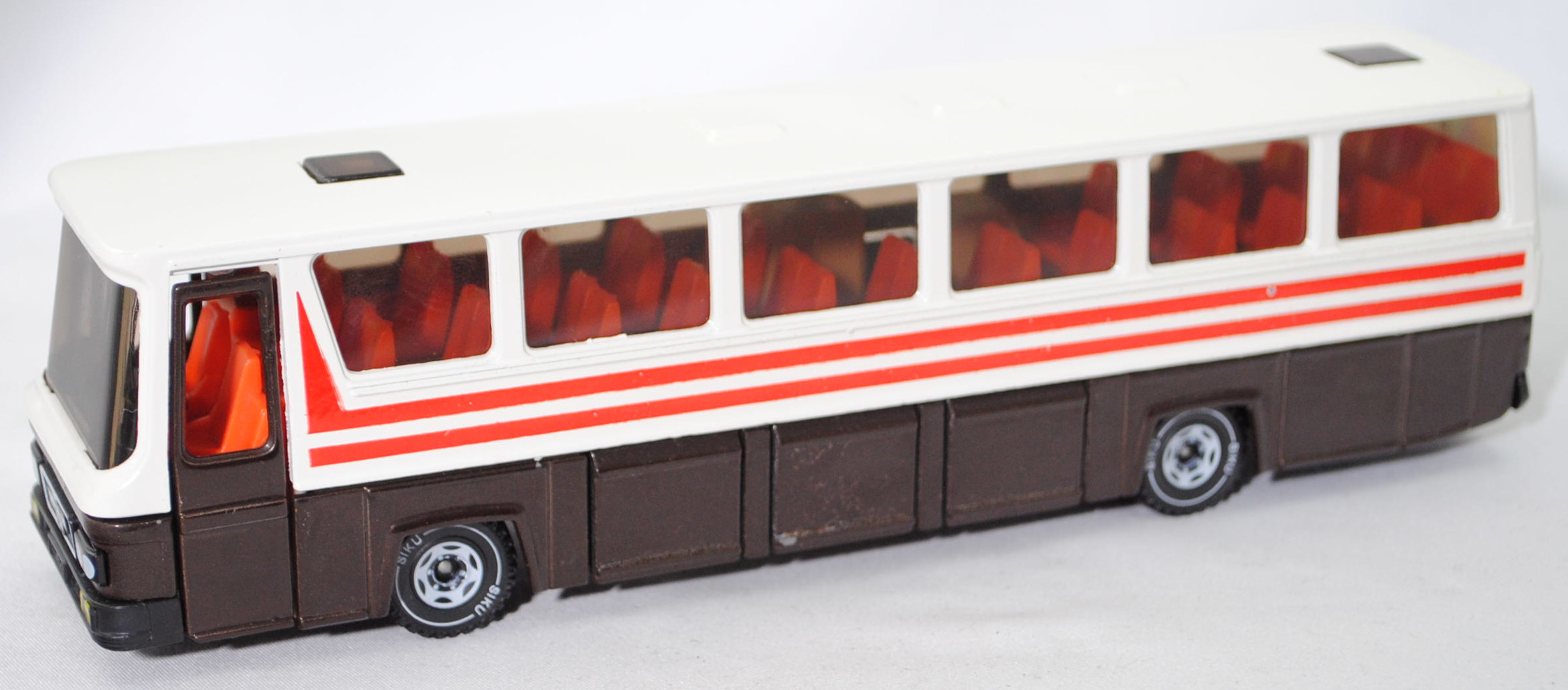 00001 MAN Reiseomnibus SR 280 (Modell 1977-1980), weiß/braun, ohne Zubehör, SIKU, 1:55, m-