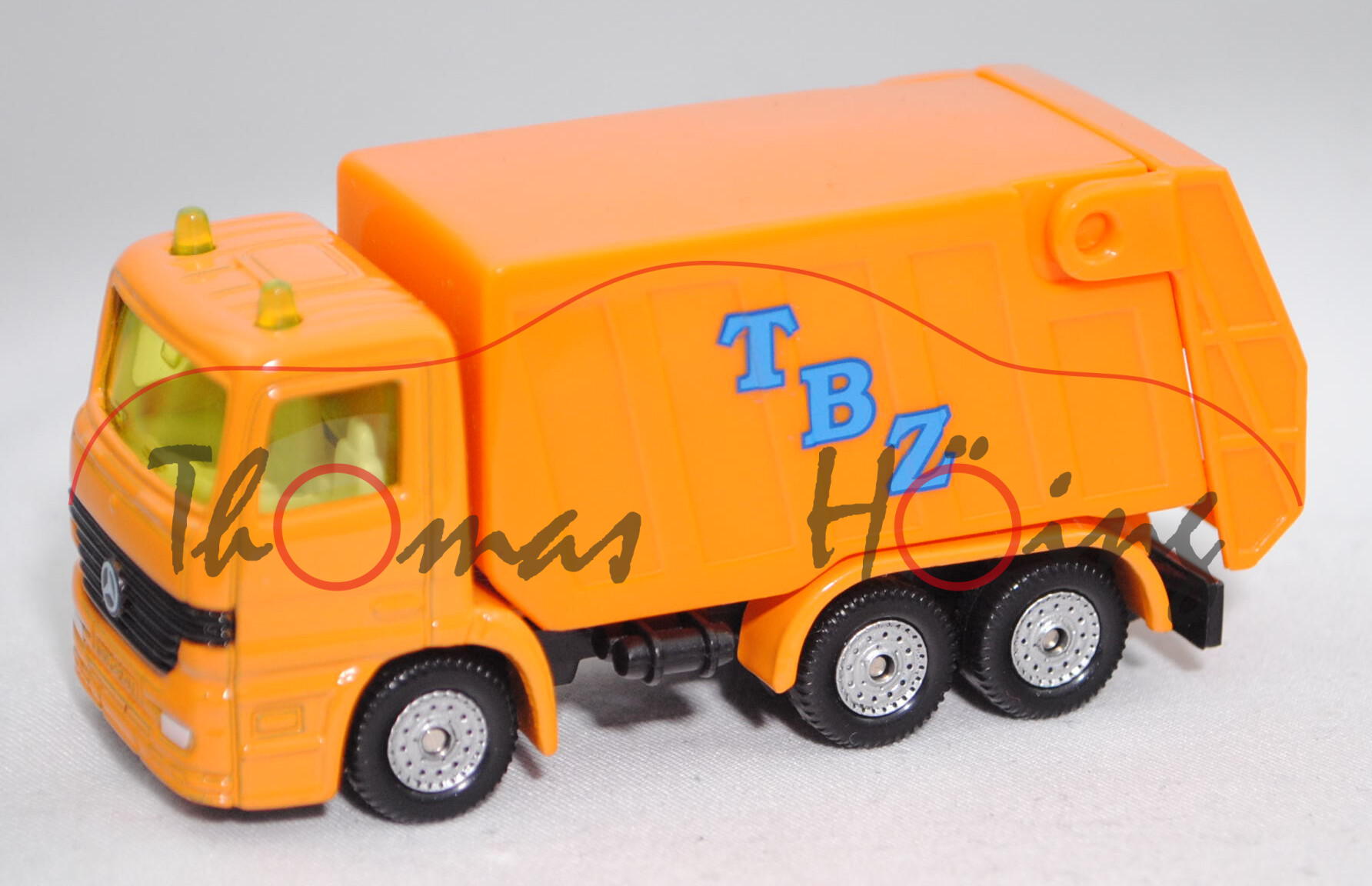 Mercedes-Benz Actros S (1. Generation, Modell 1996-2002) Müllwagen, orange, TBZ auf den Seiten