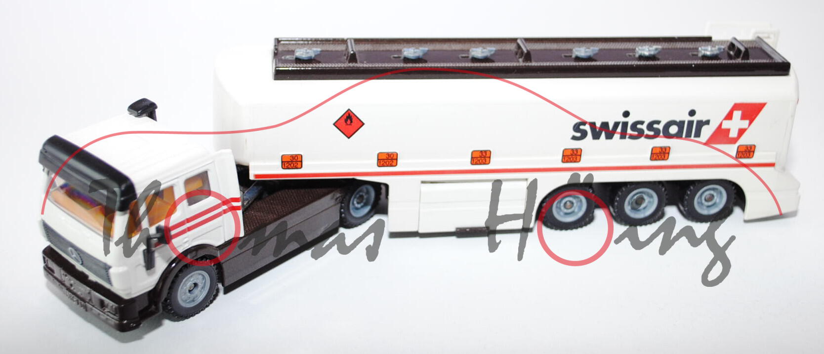 03903 Mercedes SK Tankzug mit TOPAS-Aufbau, cremeweiß/schokoladenbraun, innen gelb, swissair, Druck