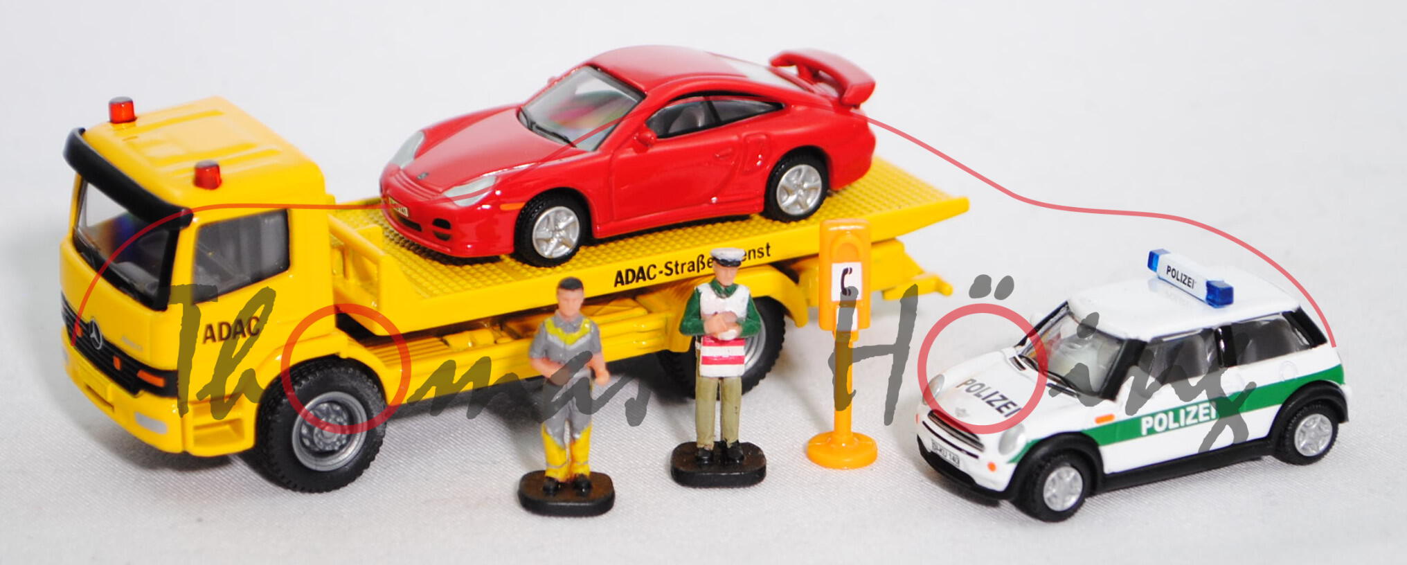 00000 Mercedes Atego Abschleppwagen mit Polizei-Mini und Porsche 911 GT2, P31R (Lagerspuren)