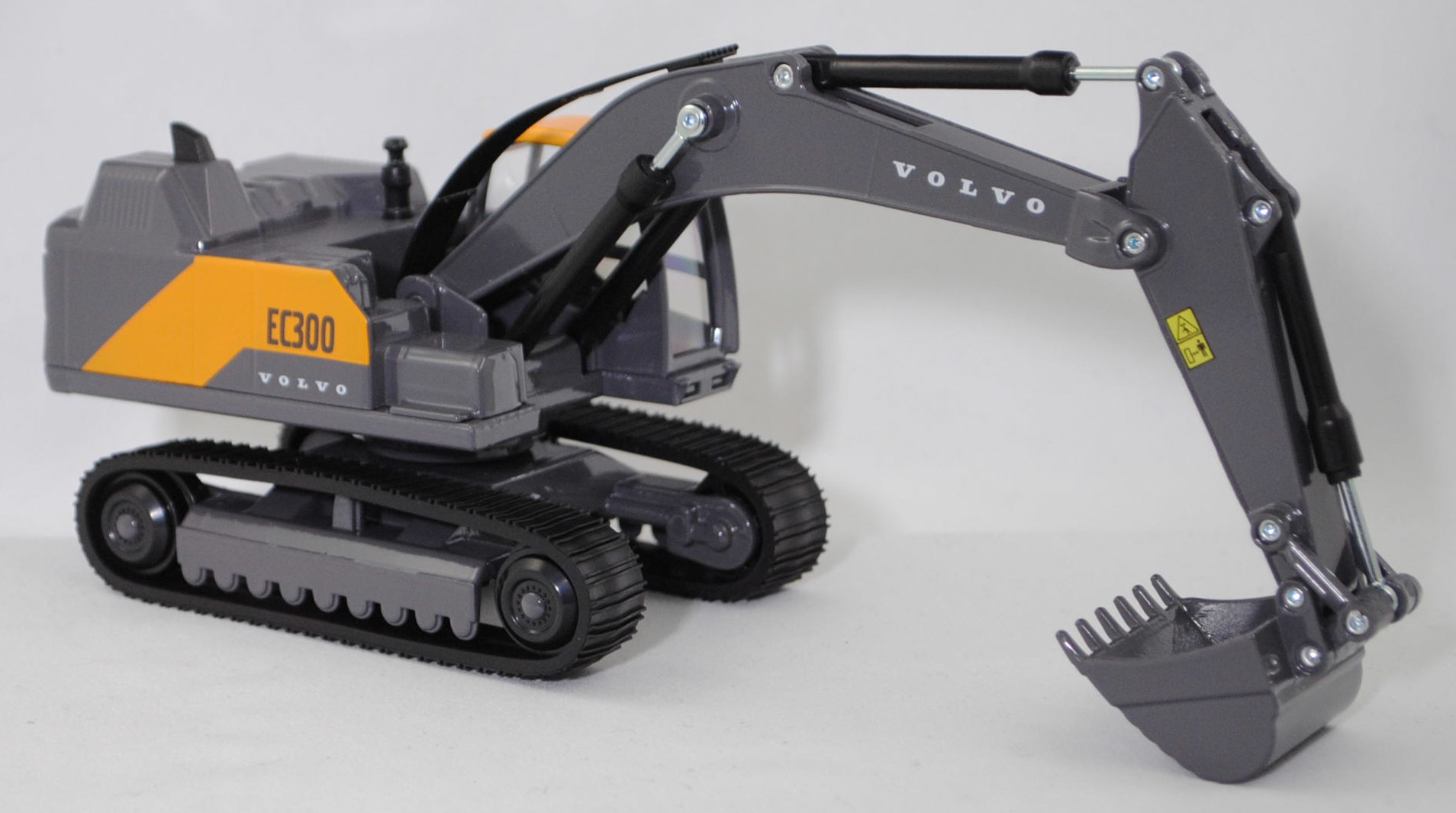 00000 Hydraulikbagger Volvo EC300 mit Tieflöffel und Raupenfahrwerk, maisgelb/blass-graubraun, Sitz schwarz, SIKU SUPER 1:50, L17mpK