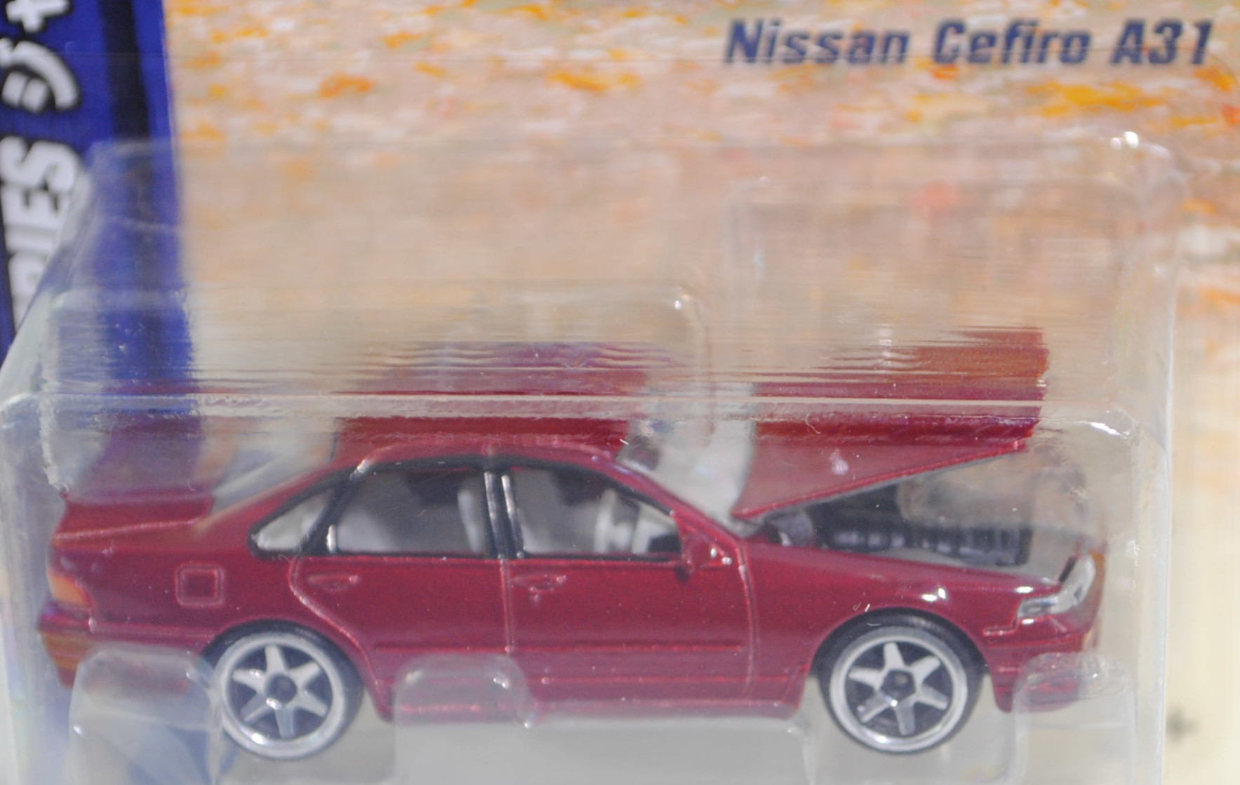 NISSAN Cefiro 2.5 A31 (1. Gen., ECA31, Modell 1988-1994), hell-weinrotmetallic, majorette, 1:58, Blister