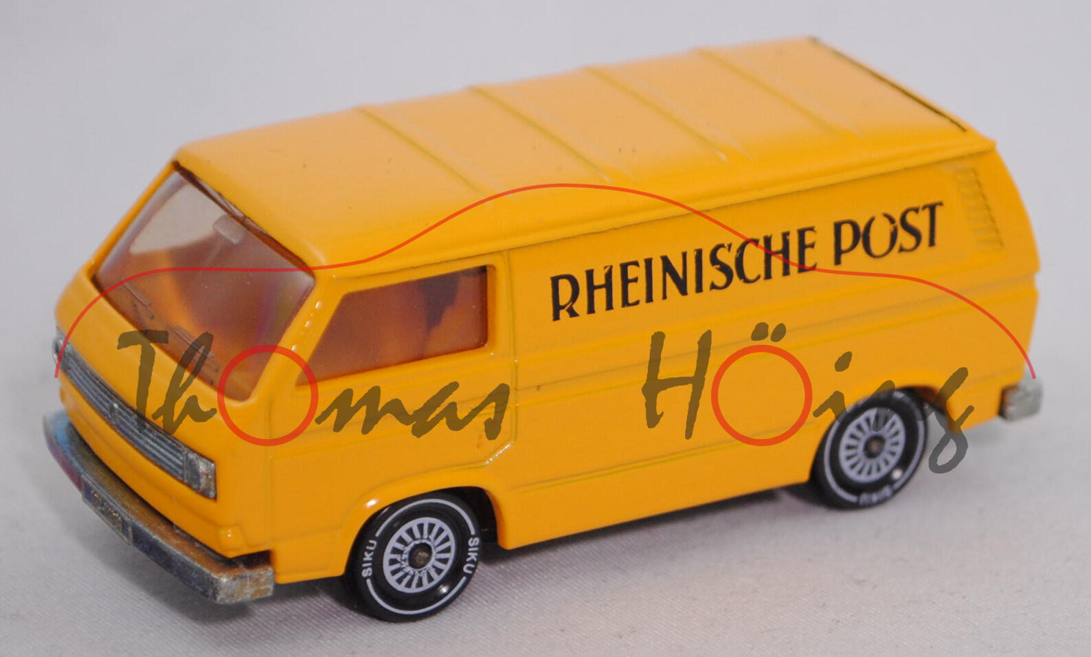 VW Transporter 2,0 Liter (Typ 2-Modell '80 T3, Modell 79-82), signalgelb, RHEINISCHE POST, Druck m-