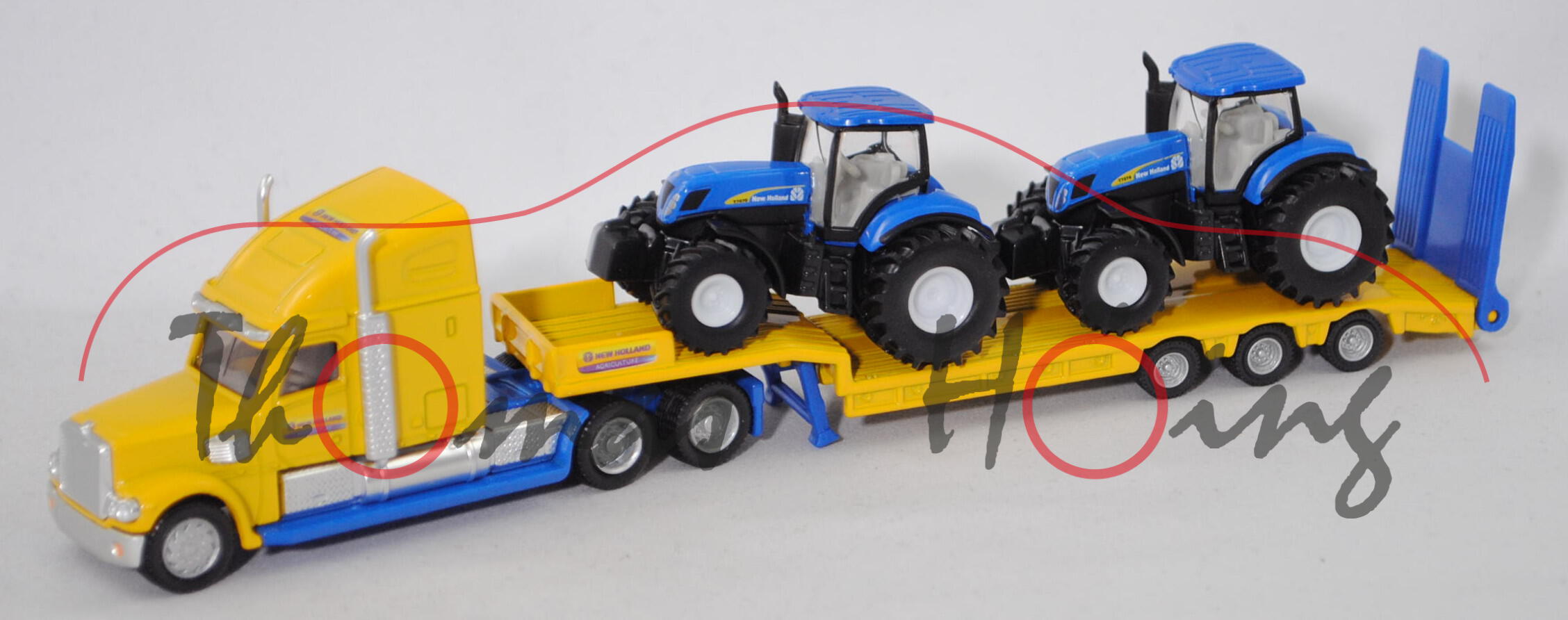 00000 FREIGHTLINER CORONADO mit New Holland T7070, gelb/blau + blau/schwarz, 1:87, L17mpK