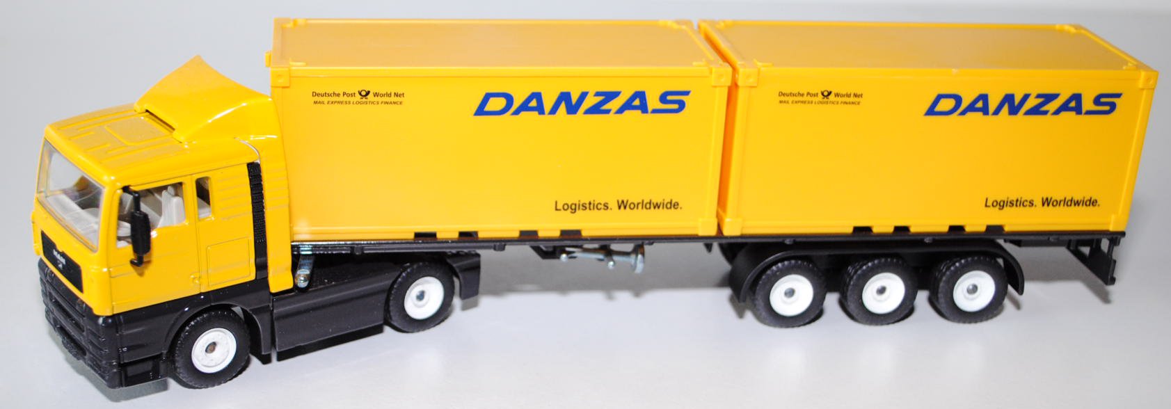 MAN TGA Container-LKW, kadmiumgelb/schwarz, DANZAS / Logistics. Worldwide., weiße LKW16, Spiegel rec