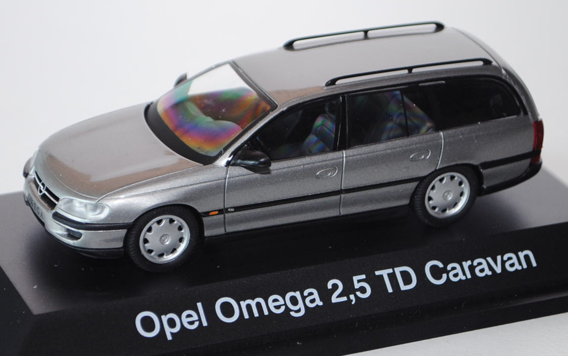 Opel Omega B 2,5 TD Caravan, Modell 1994-1999, signalgraumetallic, Schuco, 1:43, PC-Box