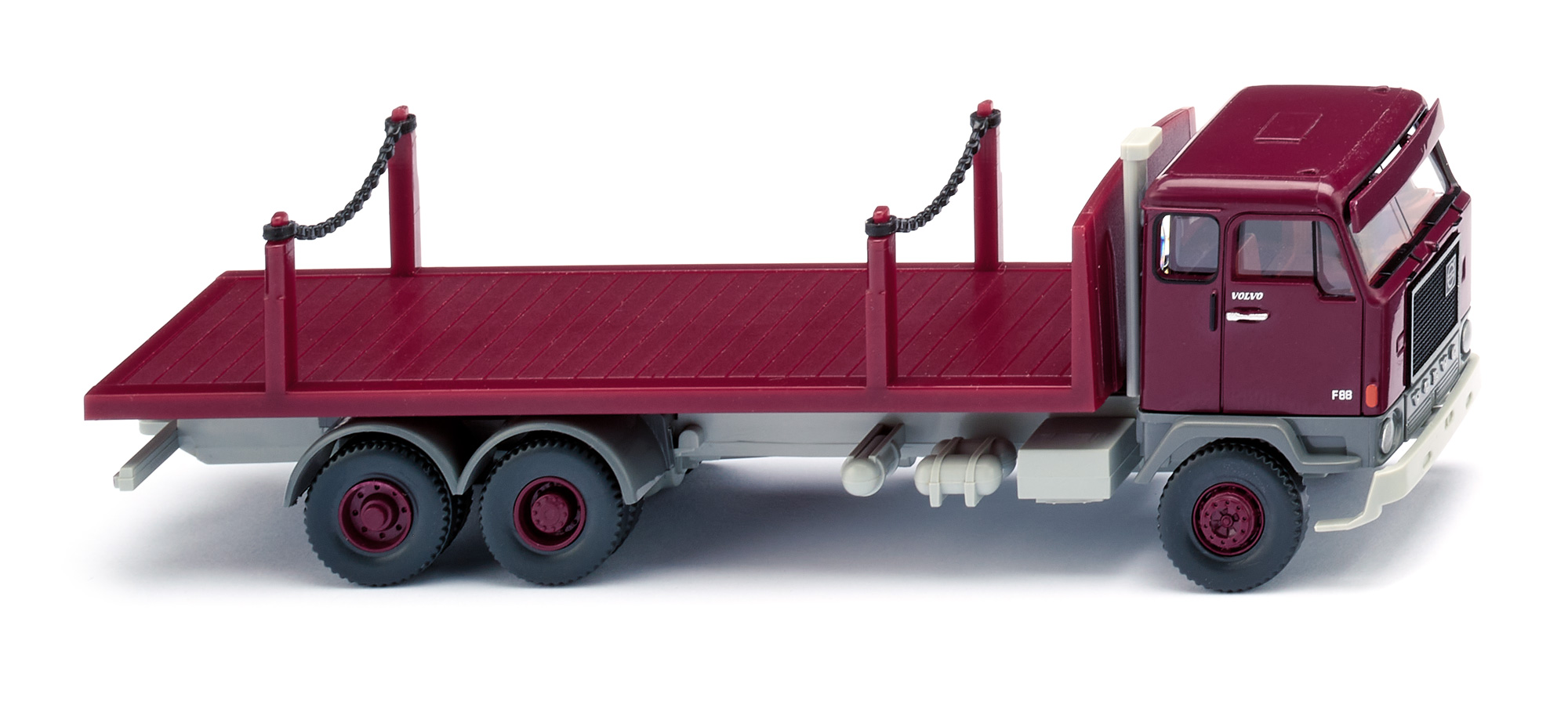 Volvo F88 (Facelift 4 von 1973, Modell 1973-1977) Rungenpritschen-LKW, Fahrerhausoberteil und Sonnenblende weinrot, Fahrerhausunterteil graphitgrau, Wiking, 1:87, mb