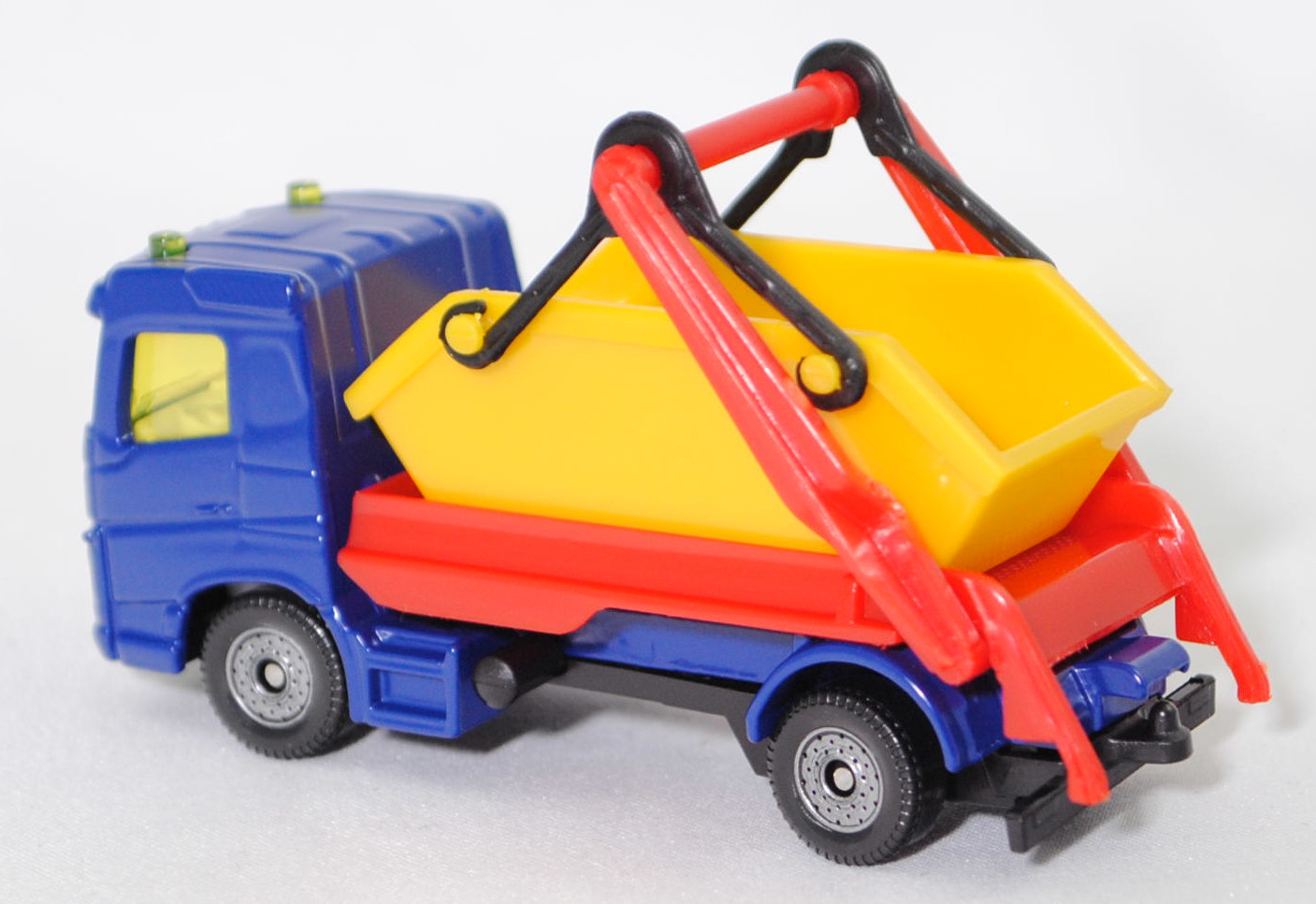 00000 Volvo FM 4x2 (3. Generation, Modell 2013-) Absetzkipper mit Absetzmulde, dunkel-ultramarinblau, Absetzvorrichtung rot, Absetzmulde gelb, SIKU SUPER, 1:82, P29f