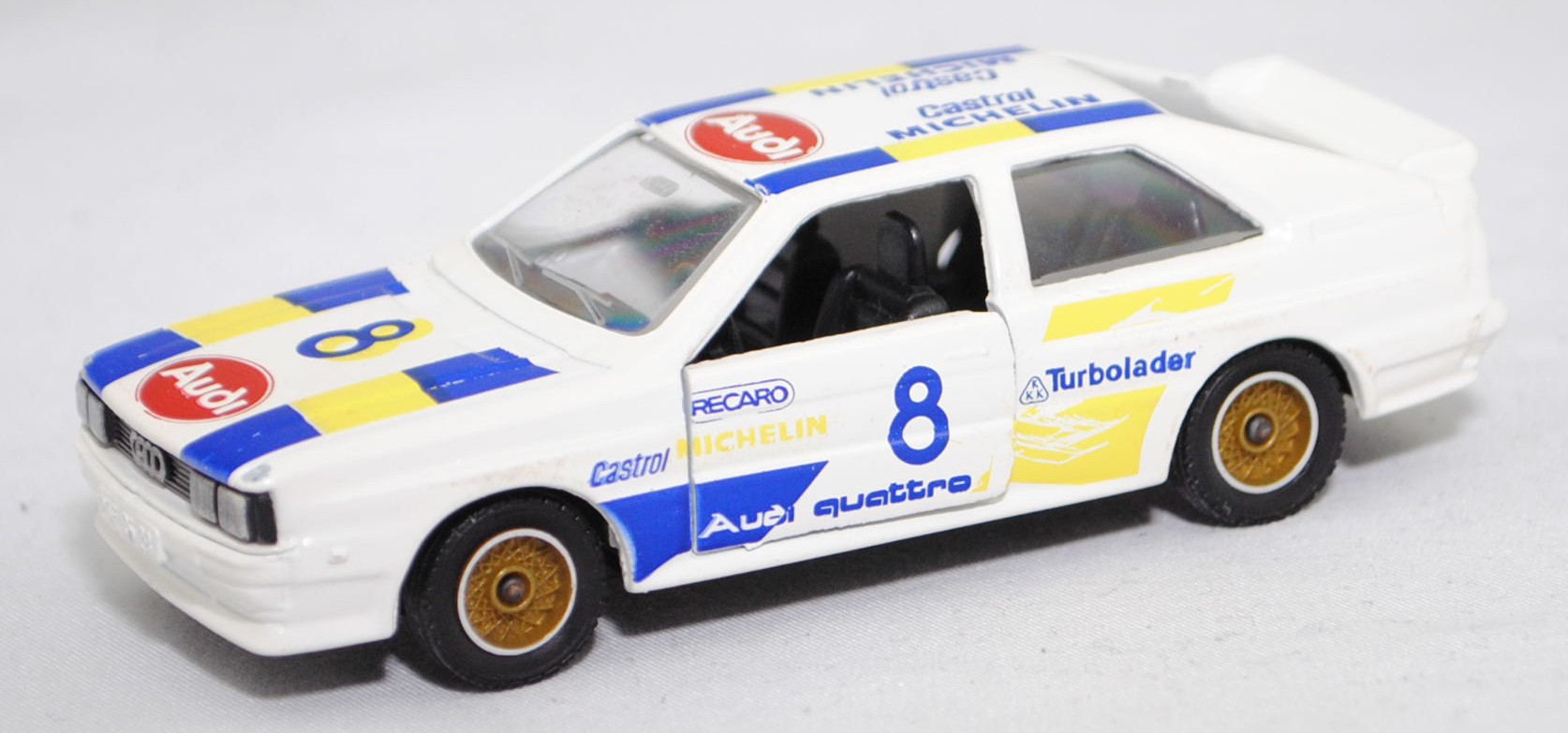 Audi quattro (B2, Typ 85Q, VFL (Vorfacelift), Modell 1980-1982) Rallye, alpinweiß (L90E), Castrol / RECARO / MICHELIN / 8 / KKK Turbolader, Solido, 1:43, m (Lackfehler)