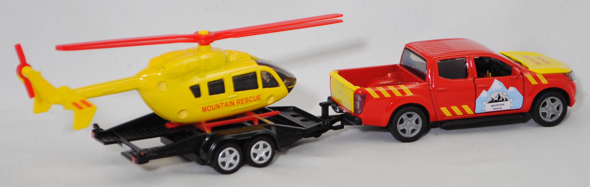 00000 NISSAN NAVARA Double Cab 4x4 (Modell 2014-2020) mit Autotransporter und Eurocopter EC 145 (Modell 2002-2014), rot/gelb, MOUNTAIN / RESCUE, SIKU SUPER 1:50, L17mpK