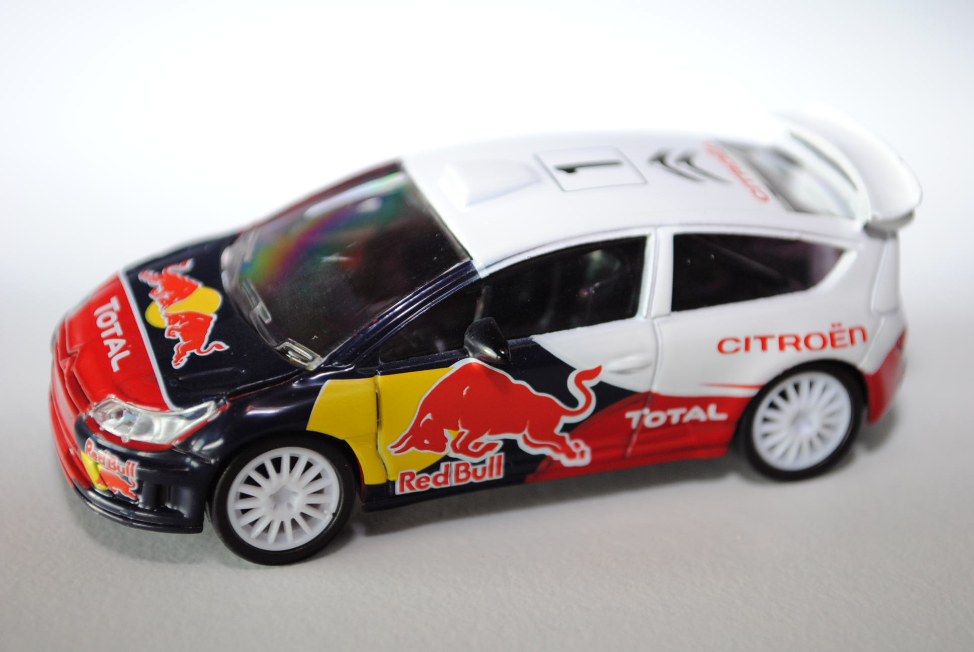 Citroen C4 WRC, reinweiß/blau/gelb/rot, CITROEN / Red Bull / TOTAL, Nr. 1, 1:50, Norev Racing, mb