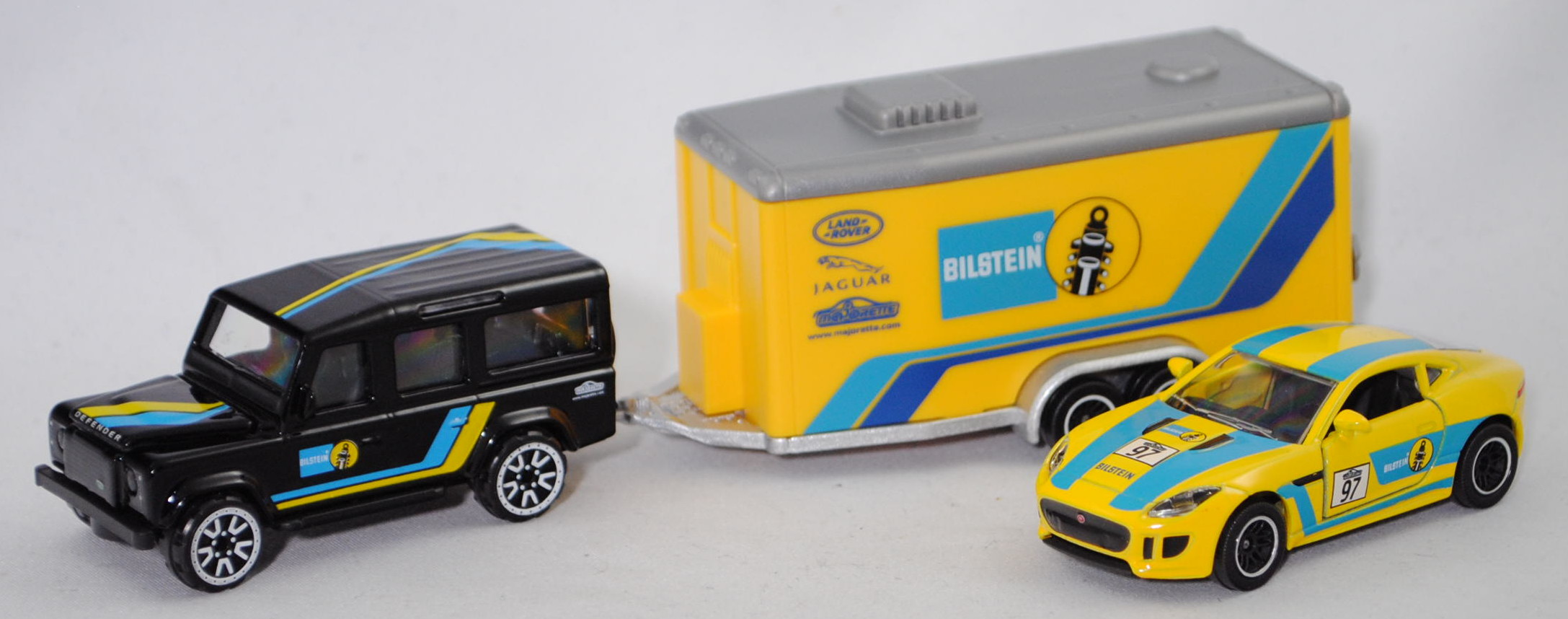 Land Rover Defender 110 + Autotransporter + Jaguar F-Type Coupé vom Team BILSTEIN, majorette, mb