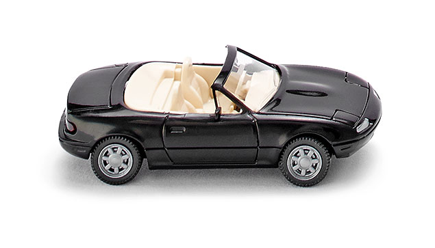 Mazda MX-5 1.6 (1. Generation, Typ NA, Modell 1989-1994), schwarz, innen hellelfenbein, Wiking, 1:87