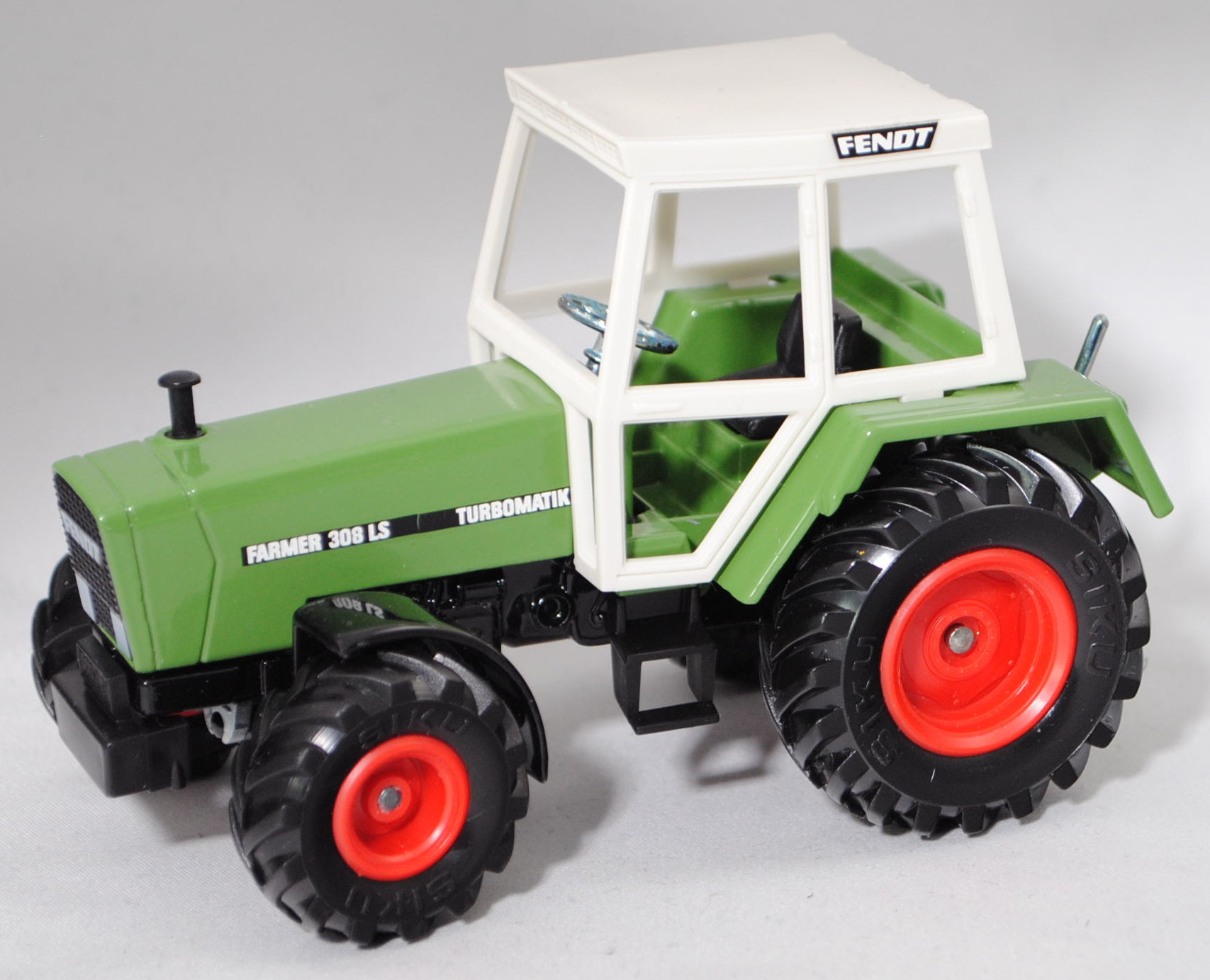 00003 FENDT FARMER 308 LS TURBOMATIK (1. Gen., Mod. 1980-1984), hell-grasgrün/schwarz, SIKU, 1:32