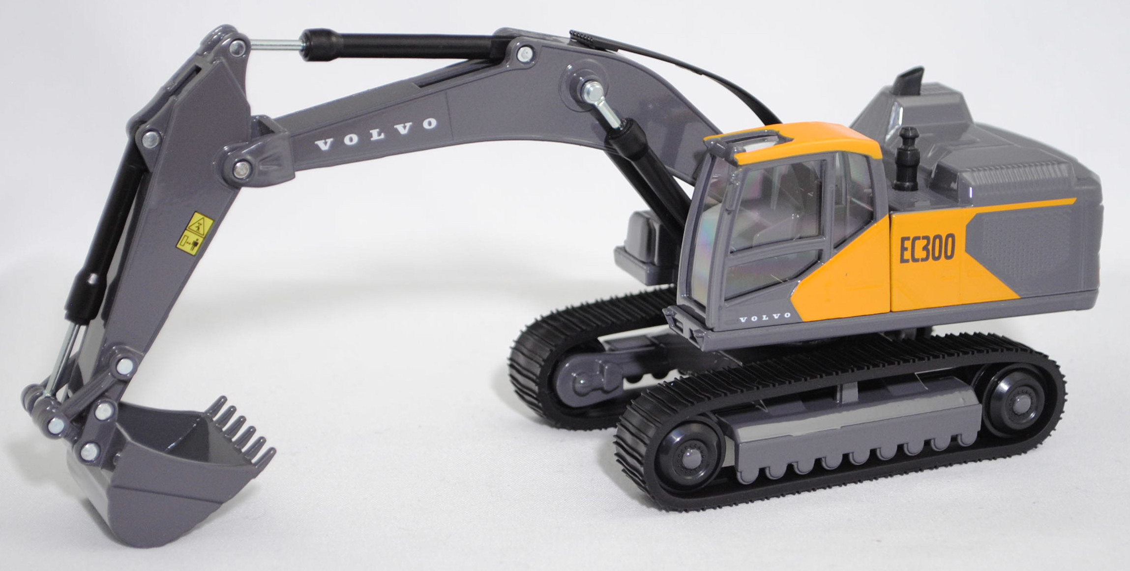 00000 Hydraulikbagger Volvo EC300 mit Tieflöffel und Raupenfahrwerk, maisgelb/blass-graubraun, Sitz schwarz, SIKU SUPER 1:50, L17mpK