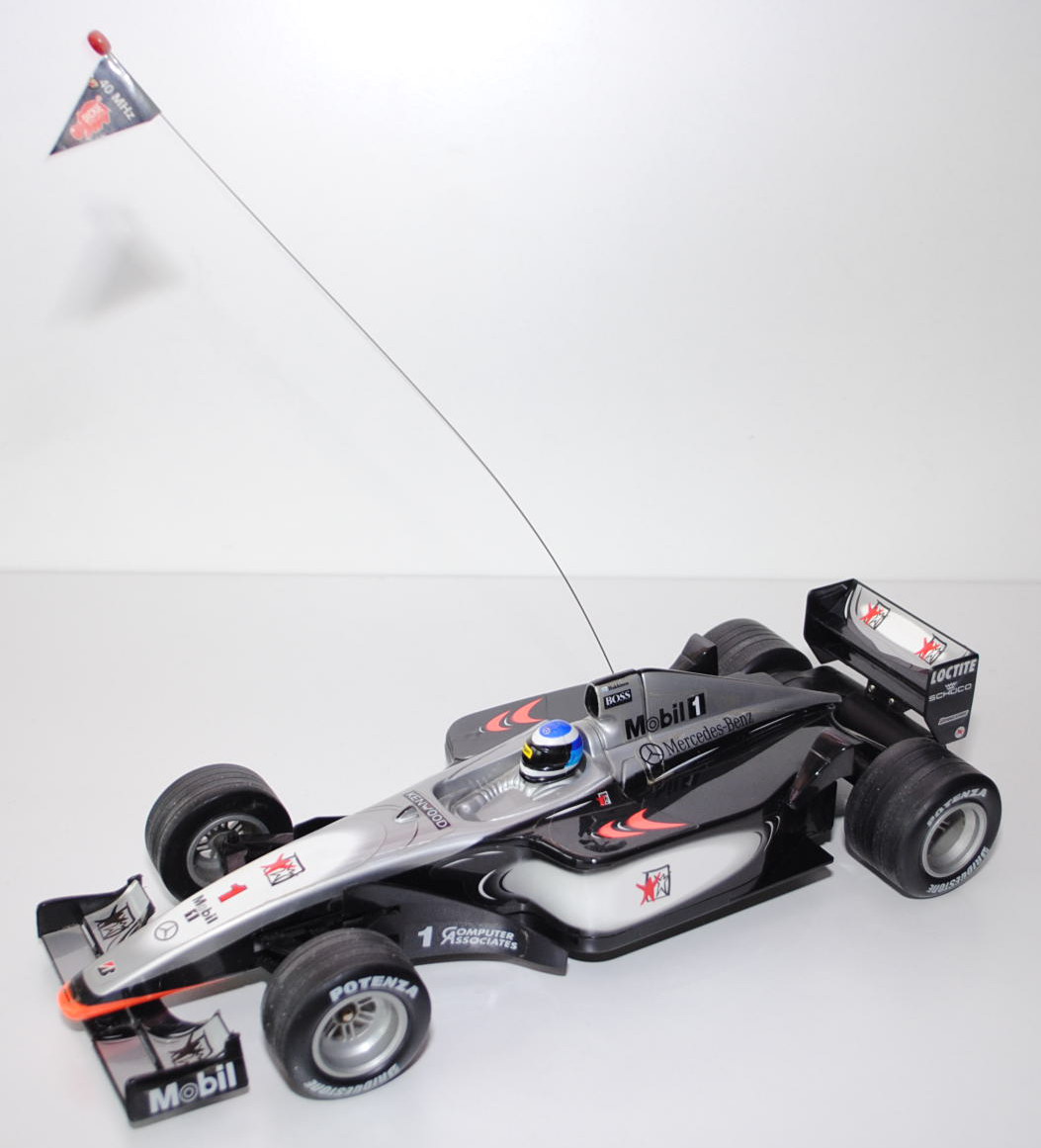 McLaren MP4/13 mit Fernsteuerung (40 MHz), silber/schwarz,  BOSS / Mobil1 / Mercedes-Benz / BRIDGEST