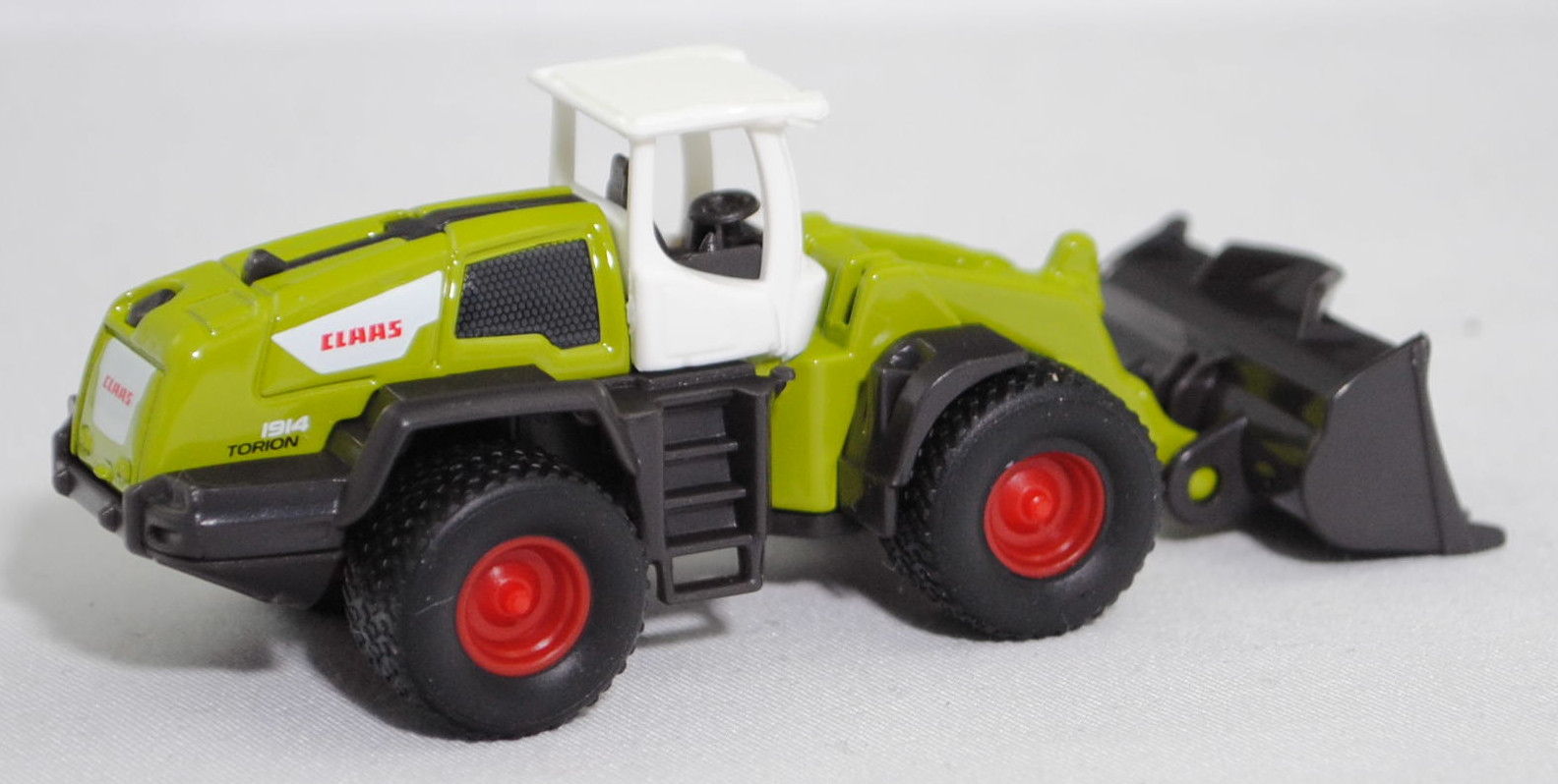 00001 CLAAS Radlader TORION 1914 mit Erdbauschaufel mit Aufreißzähnen (Modell 2017-), reinweiß/claasgrün, seitliche Motorbelüftung Teil der Karosserie, SIKU SUPER, 1:102, P29f