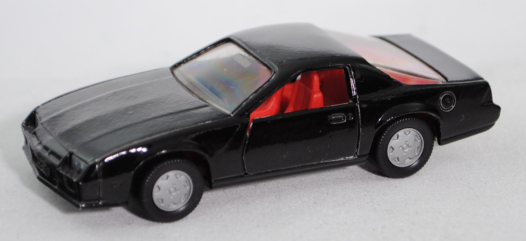 00004 Chevrolet Camaro Berlinetta (3. Gen., Mod. 1982-1984), schwarz, innen verkehrsrot, Lenkrad sc