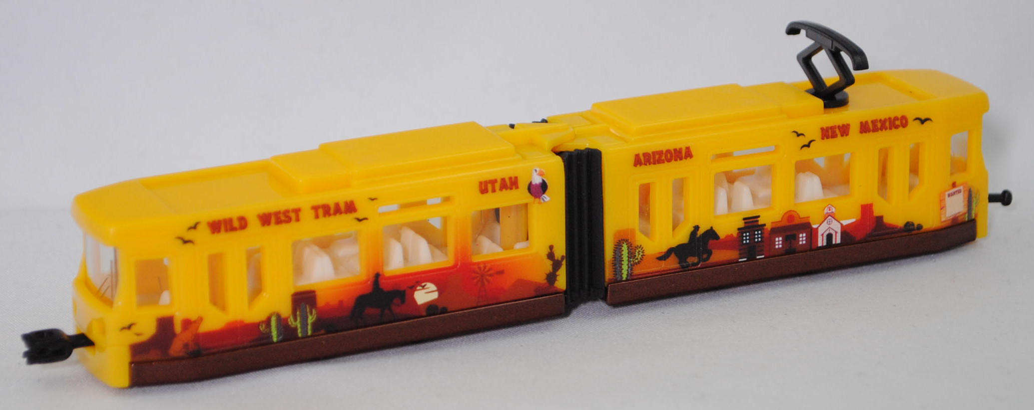 00014 ADtranz GT4N-ZR Niederflur-Straßenbahn (Modell 1997-2009), Wagenkästen verkehrsgelb, WILD WEST TRAM UTAH ARIZONA NEW MEXICO, SIKU SUPER, 1:117, P29f