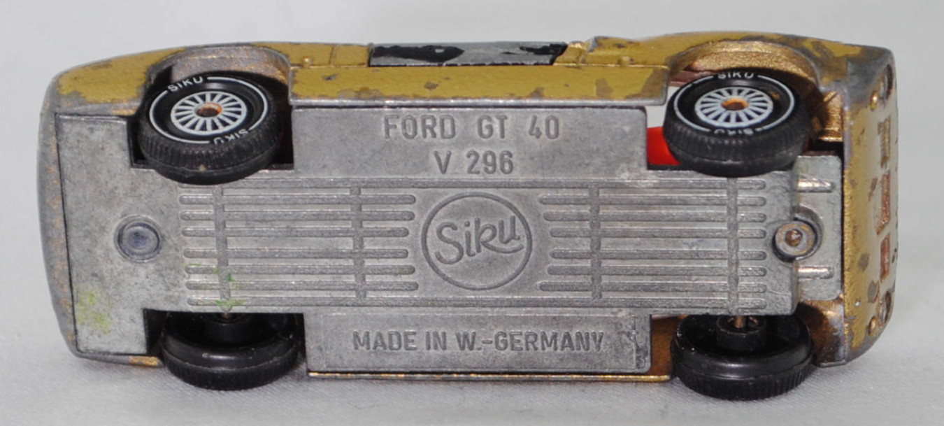 00005 Ford GT40 (Mk I bzw. Mark 1, Modell 1965-1967), Karosserie goldmetallic, Türen schwarz, Bpr. V 296 / W-Germ, Verglasung klar, R11 gerillt, SIKU SUPER, 1:57, vsc