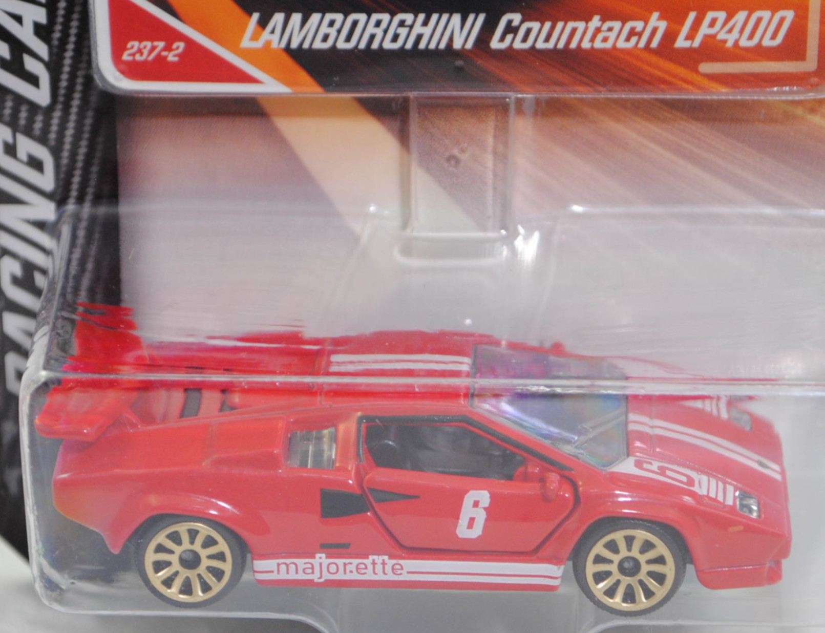 Lamborghini Countach LP 400 (1. Gen., Mod. 74-78), hell-karminrot, Nr. 6, Nr. 237-2, majorette, 1:56, Blister