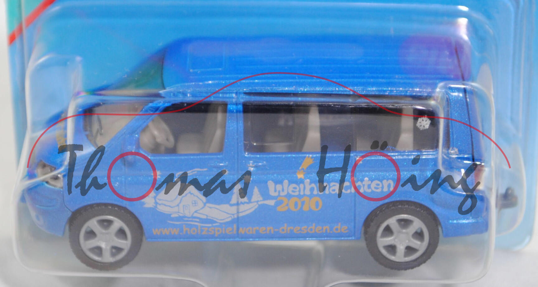 00004 VW T5.1 Multivan (Modell 2003-2009), hell-verkehrsblaumetallic, Holzspielwarenladen, P29b