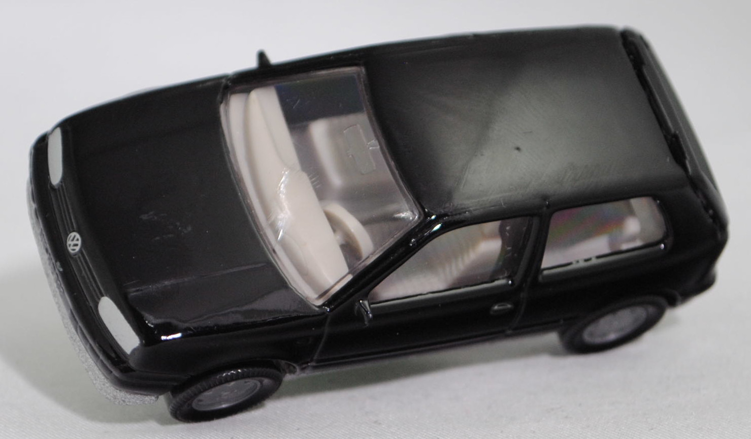 00004 VW Golf III 1.8 GL (Typ 1H, Vorfacelift, Modell 1991-1994), schwarz, innen grau, Lenkrad grau, Chassis silber, Hong, Bpr. 1010 / 0842, SIKU SUPER, 1:56, m (Lenkrad schief)