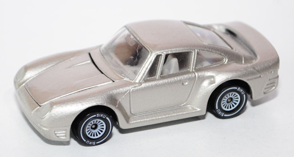 00006 Porsche 959 (Modell 1986-1988), champagnermetallic, innen reinweiß, Lenkrad reinweiß, Heckflüg