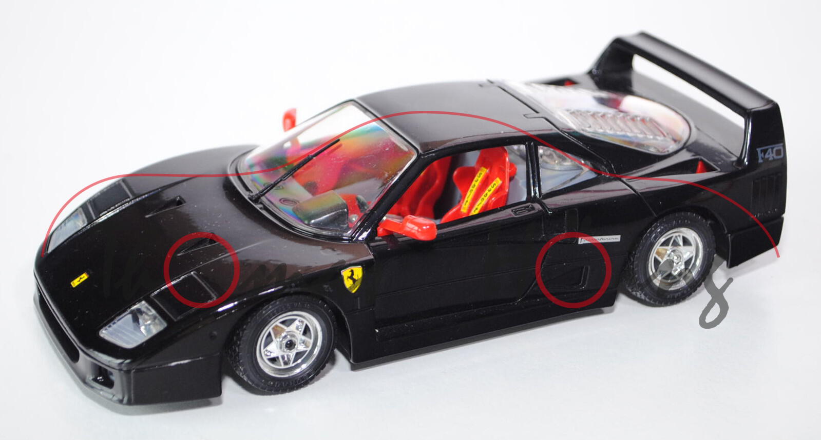 Ferrari F40, Modell 1987, schwarz, Türen + Motorhaube zu öffnen, mit Lenkung, Bburago DIE CAST VIP, 