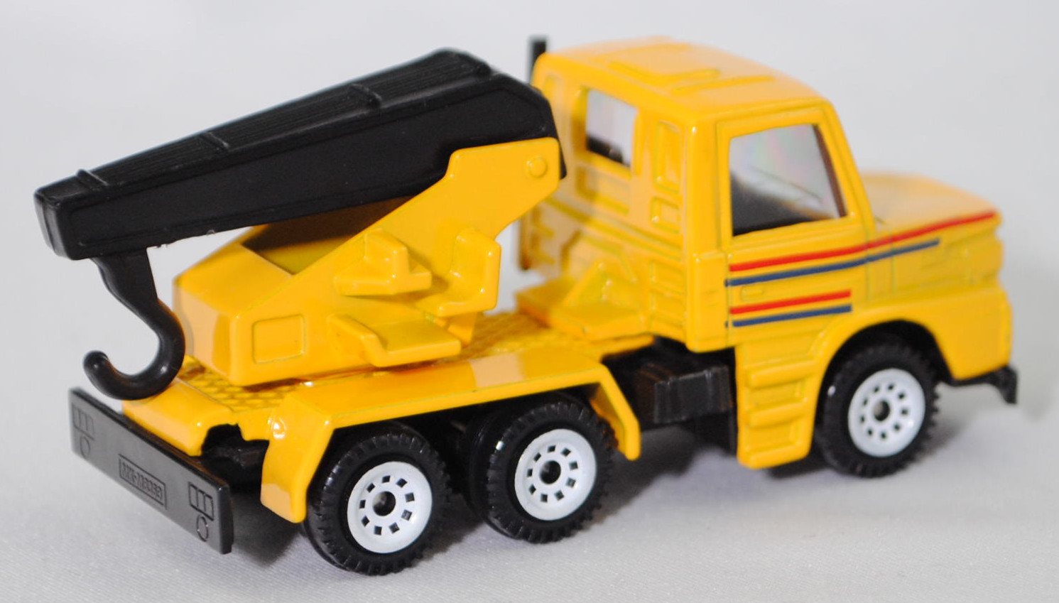 00001 Scania T143H-400 6x4 (Modell 1988-1991) Abschleppwagen, gelb, Kranfuß gelb, Ausleger schwarz, Bpr. 0808/1013/1014, C1 weiß, SIKU SUPER, 1:93, m
