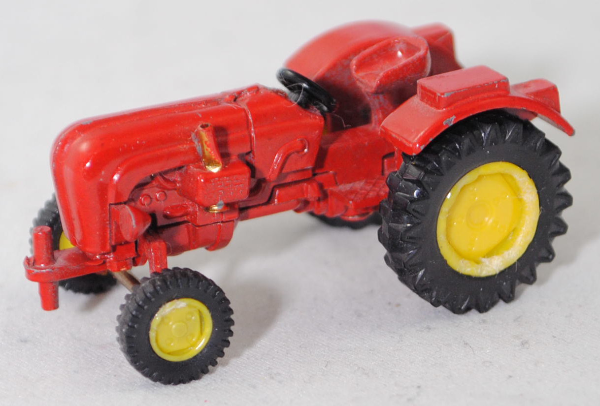 00004 PORSCHE-DIESEL STANDARD T 217 (Modell 1960-1962), rot, Lenkrad schwarz, mit Auspuff, Dorn der Anhängerkupplung oben und unten, SIKU, 1:60, m-