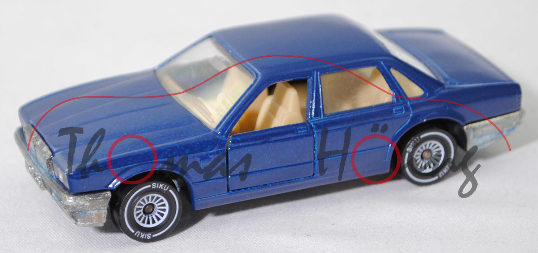 00001 Jaguar Sovereign 3.6 (Baureihe XJ40, Mod. 1986-1989), saphirblau, innen hell-beige, SIKU, 1:58