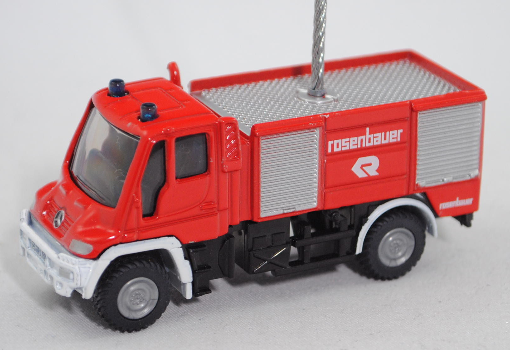 MB Unimog U 500 (Baureihe U 405, Mod. 01-06) Feuerwehr TLF (Rosenbauer) als Zettelhalter, Werbebox