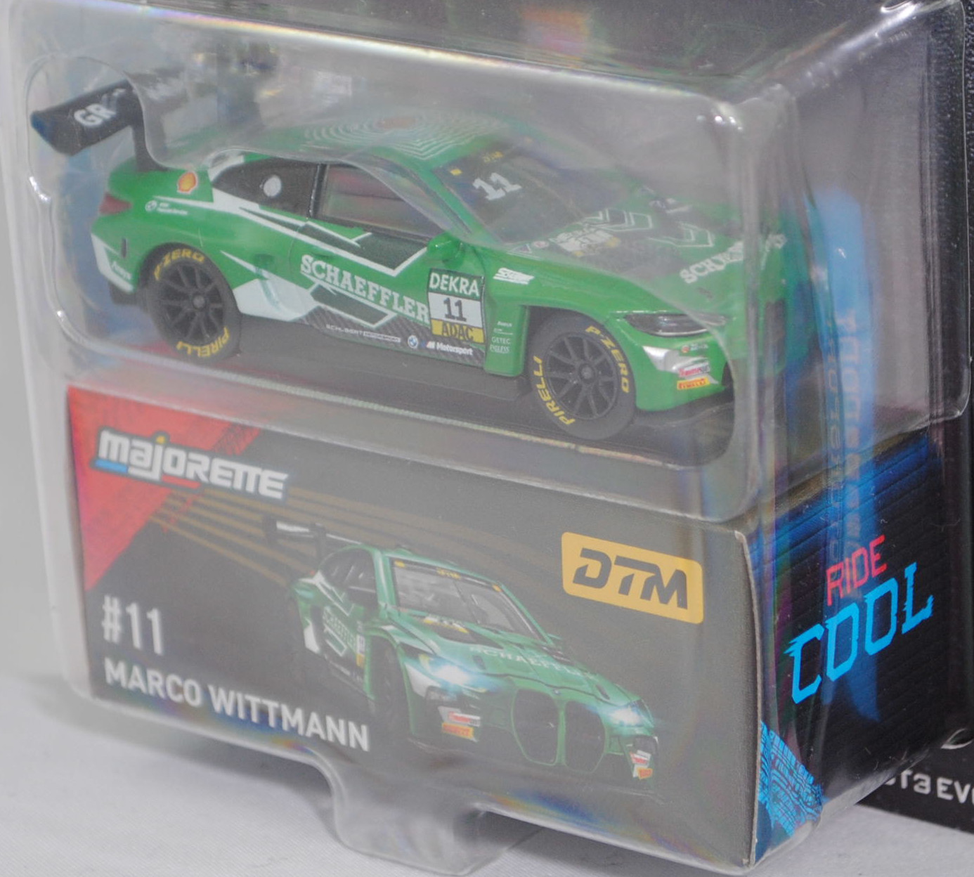 BMW M4 GT3 EVO (G82, Homologationsnummer GT3-053, Modell 2024-) (Nr. 257I), grün/weiß, DTM 2025, Marco Wittmann, Nr. 11, Schubert Motorsport, majorette, 1:65, Blister