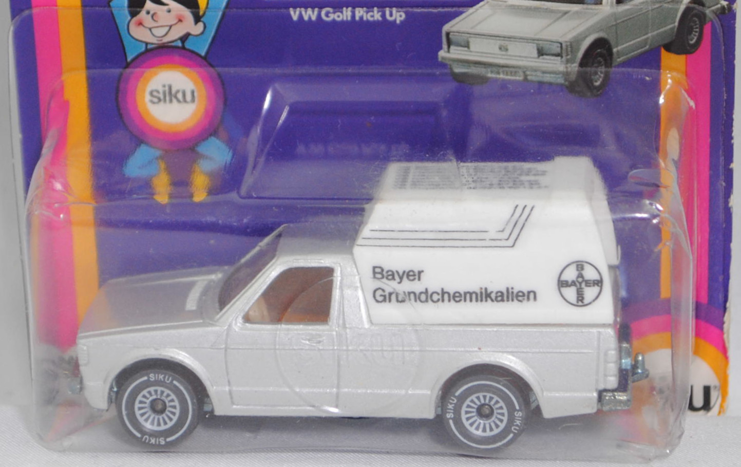 VW Pickup Truck LX (vgl. VW Caddy I) (14D, Typ 147, Modell 1981-1983) mit Kastenaufbau, silbergraumetallic, Bayer / Grundchemikalien, VOLKSWAGEN in rot auf Heckklappe, P18