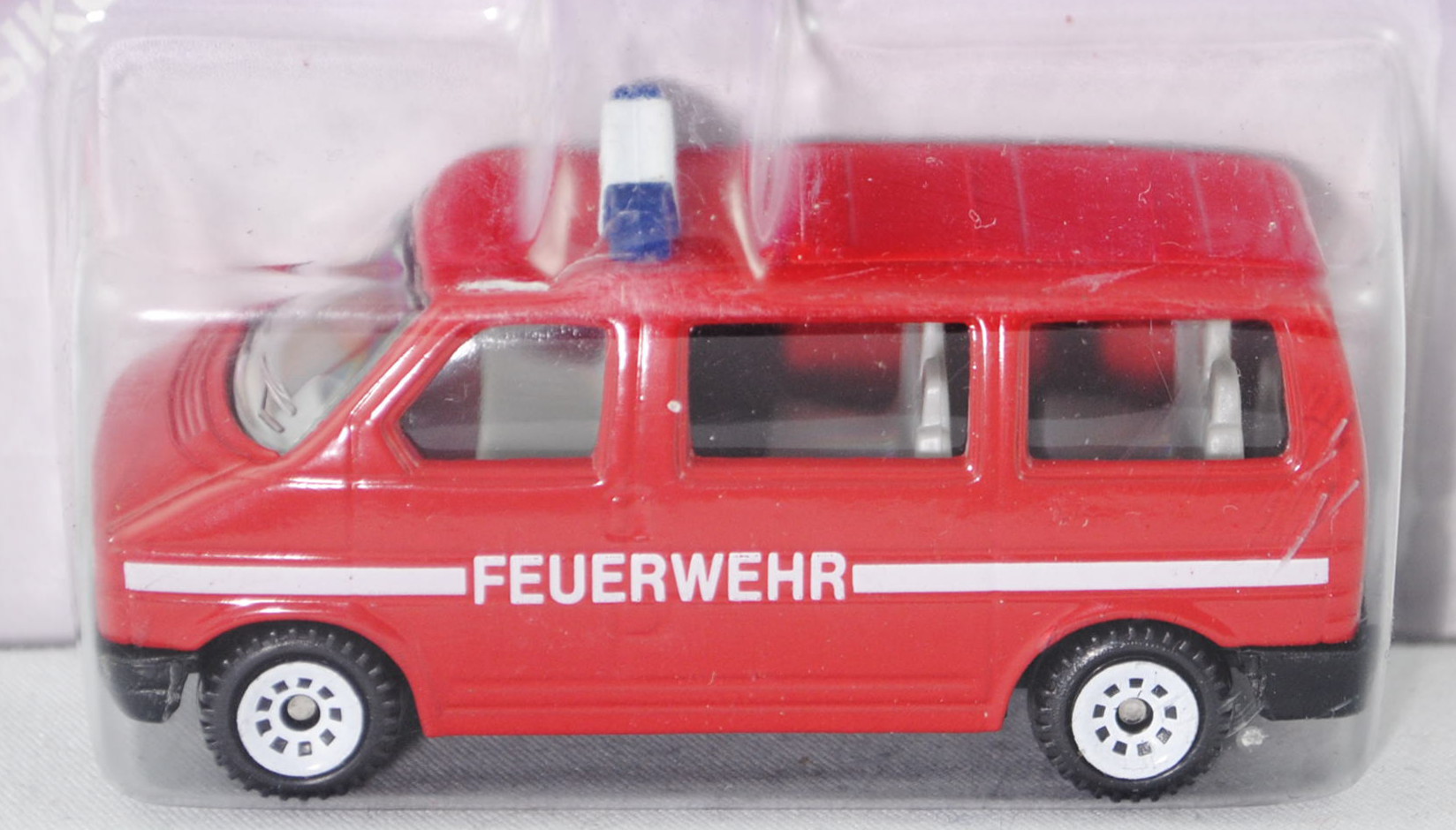 VW T4 Caravelle (Modell 1990-1995) Feuerwehrbus, signalrot, innen lichtgrau, Lenkrad integriert, FEU