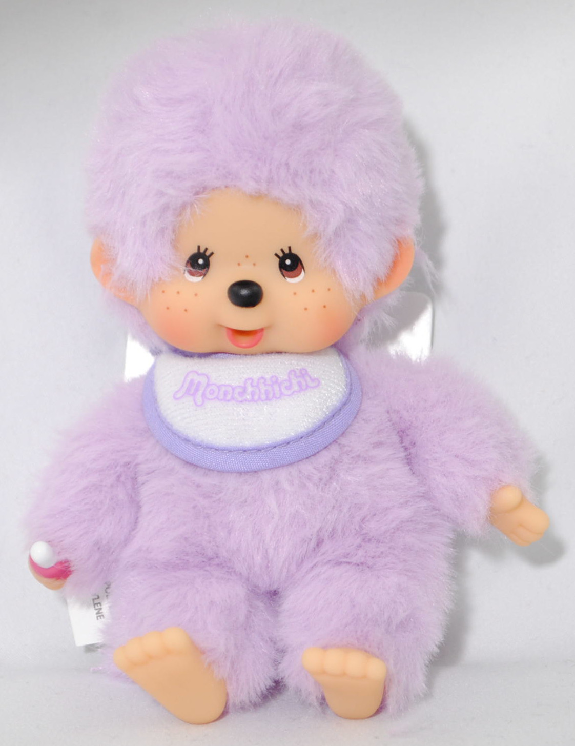 Monchhichi Colors Plush figure with bib (Plüschfigur Monchhichi mit Latz lila), 15 cm groß, Sekiguchi (EAN 4905610201495)