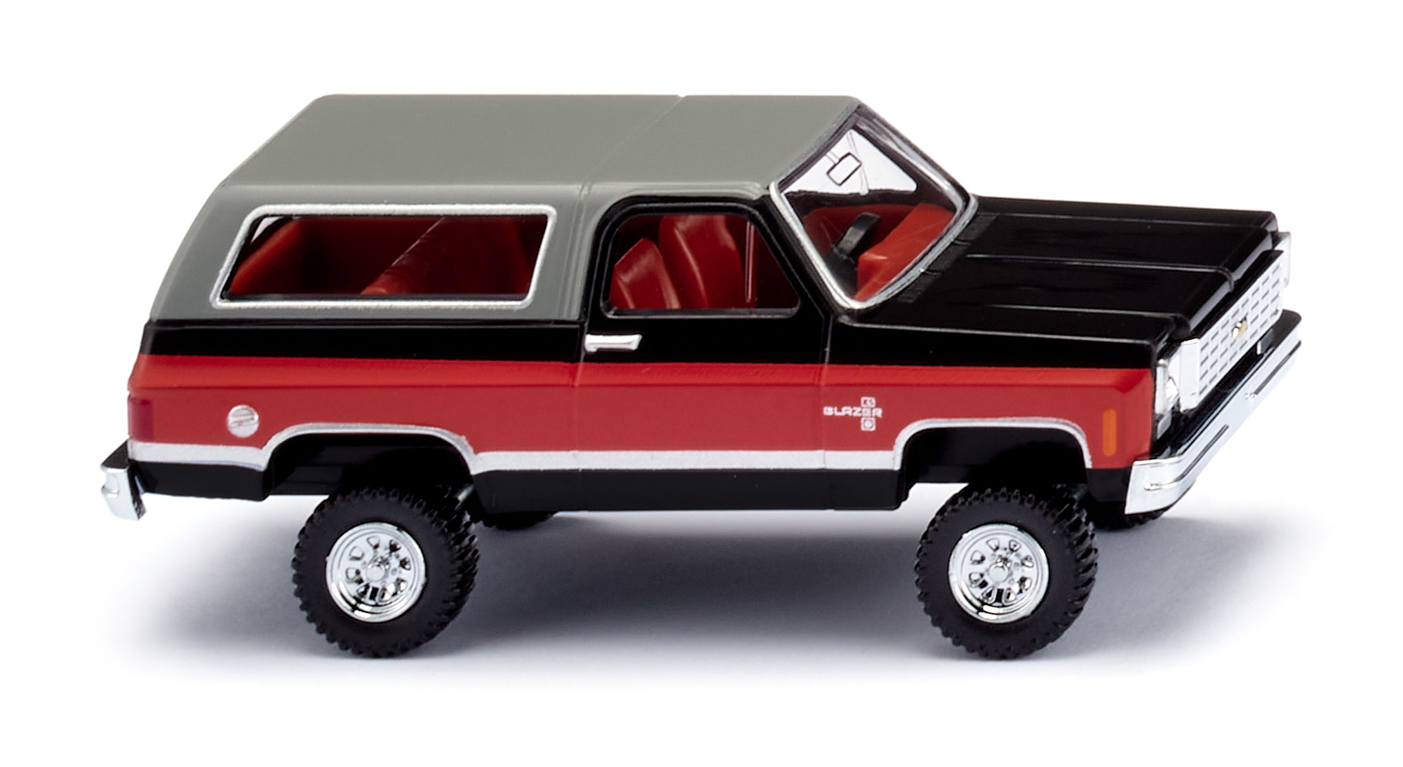 Chevrolet K5 Blazer (2. Generation, Facelift 1975 zum Modelljahr 1976, Modell 1975-1976), Karosserie schwarz, Streifen in rot auf den Seiten, Wiking, 1:87, mb