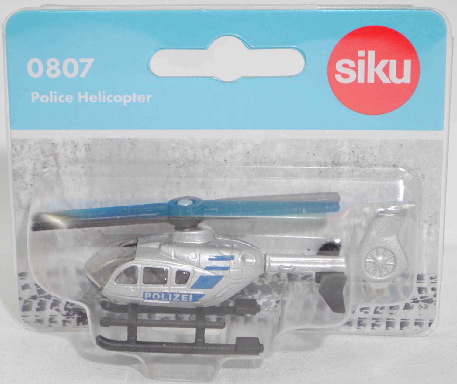 00011 Polizei-Hubschrauber Eurocopter EC 135 T1 (Modell 1996-2002), silbergraumetallic, POLIZEI, Druck Chargennummer auf dem Boden der Kabine, SIKU SUPER, 1:144, P29f