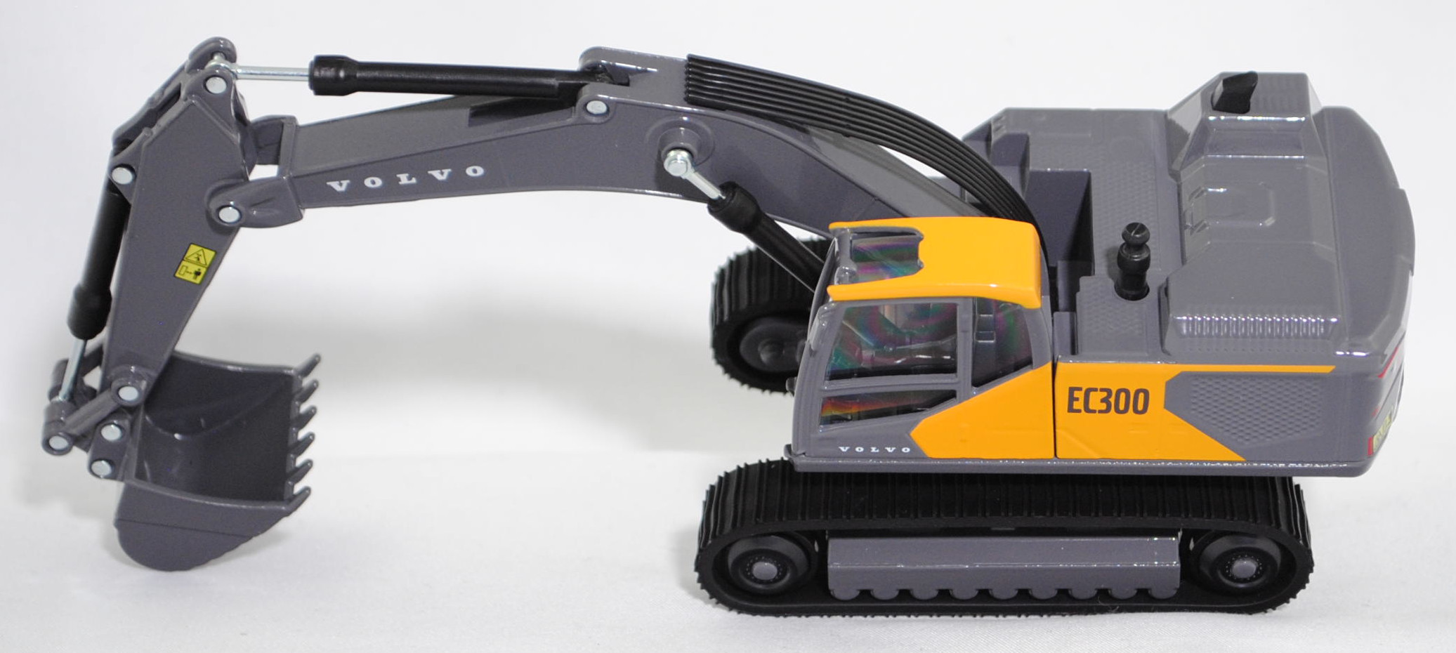 00000 Hydraulikbagger Volvo EC300 mit Tieflöffel und Raupenfahrwerk, maisgelb/blass-graubraun, Sitz schwarz, SIKU SUPER 1:50, L17mpK