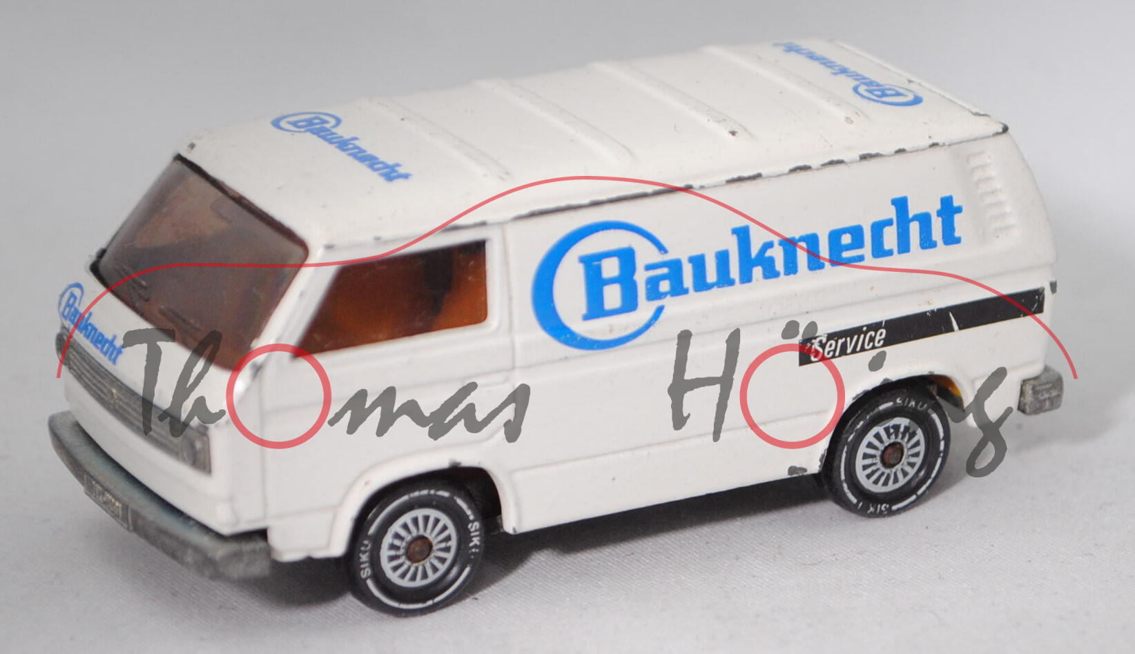 VW Transporter 2,0 Liter (Typ 2-Mod. '80 T3, Modell 1979-1982), cremeweiß, Bauknecht, Farbabplatzer