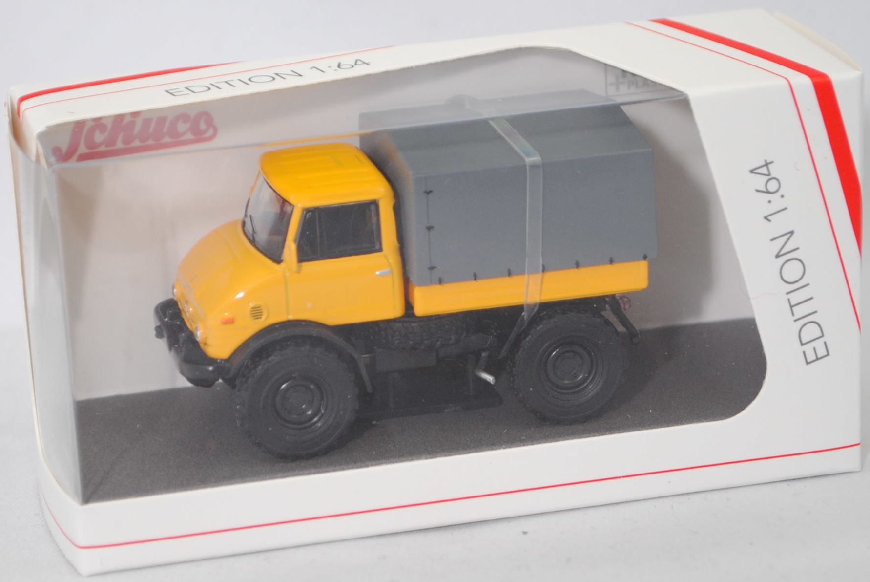 Mercedes-Benz Unimog U84 / U900 (Baureihe 406, Modell 1971-1988) mit Pritsche und Plane, Fahrerhaus hell-signalgelb, Plane grau, Schuco by Minimax, EDITION 1:64, mb (Limited)