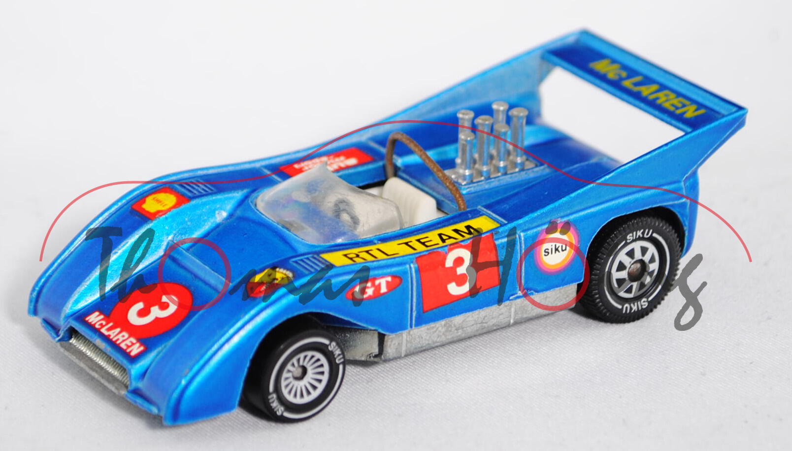 00002 McLaren M8F (CanAm-Prototyp, Modell 1971-1972), himmelblaumetallic, innen weiß, Lenkrad schwar