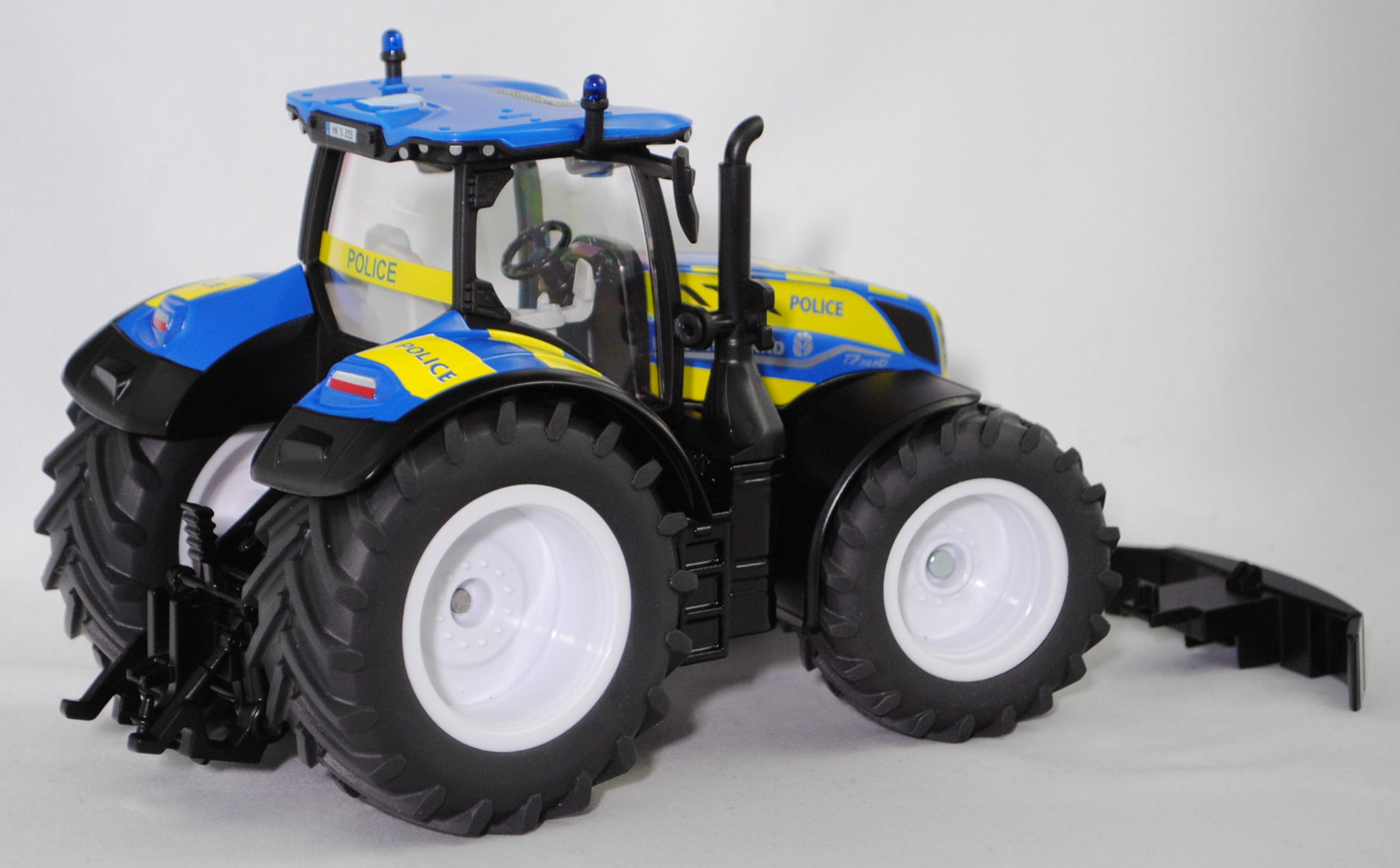 00000 New Holland T7.315 HD AC New Generation (2. Generation, Modell 2021-) Polizei Traktor, hell-signalblau/mattschwarz, POLICE, SIKU FARMER 1:32, L17mpK
