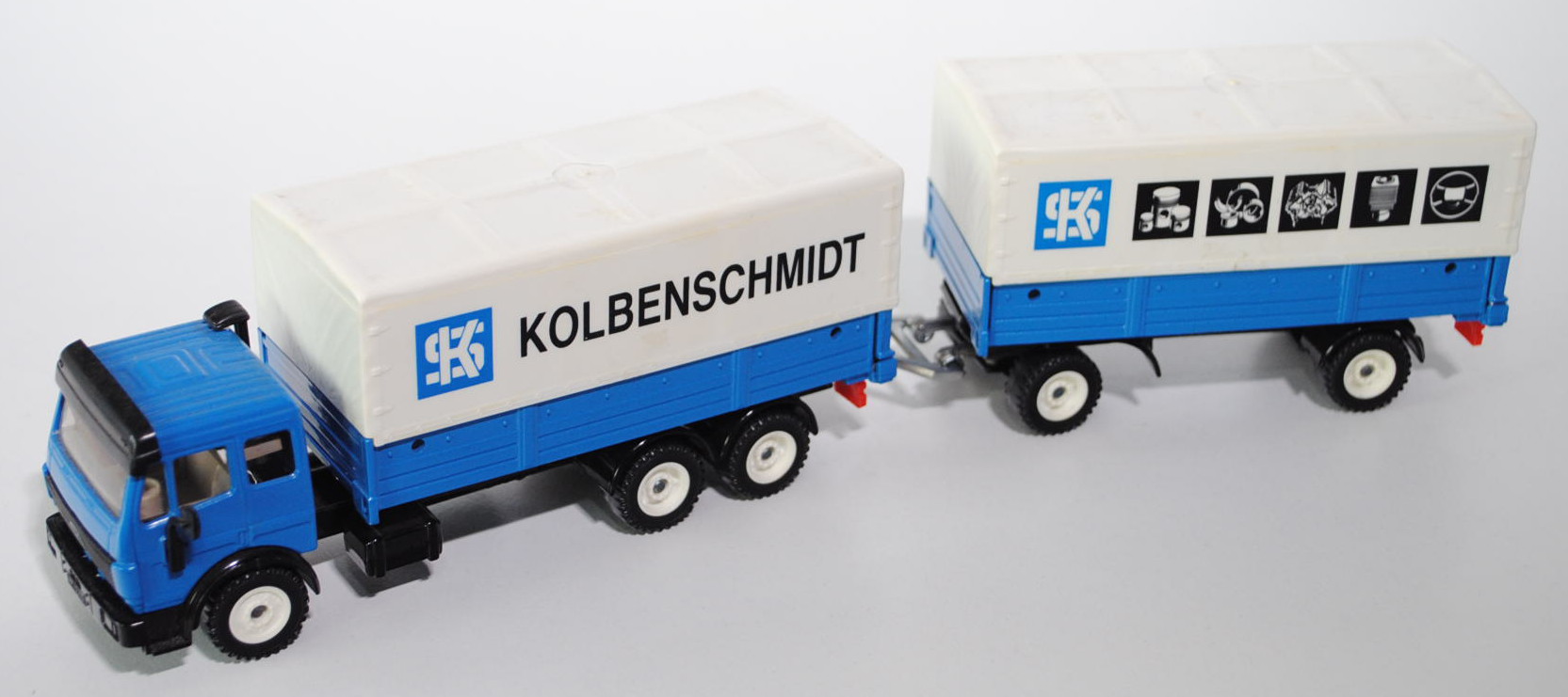 Mercedes SK LKW mit Pritsche und Plane, himmelblau/schwarz, SK KOLBENSCHMIDT sowie SK und Abbildunge