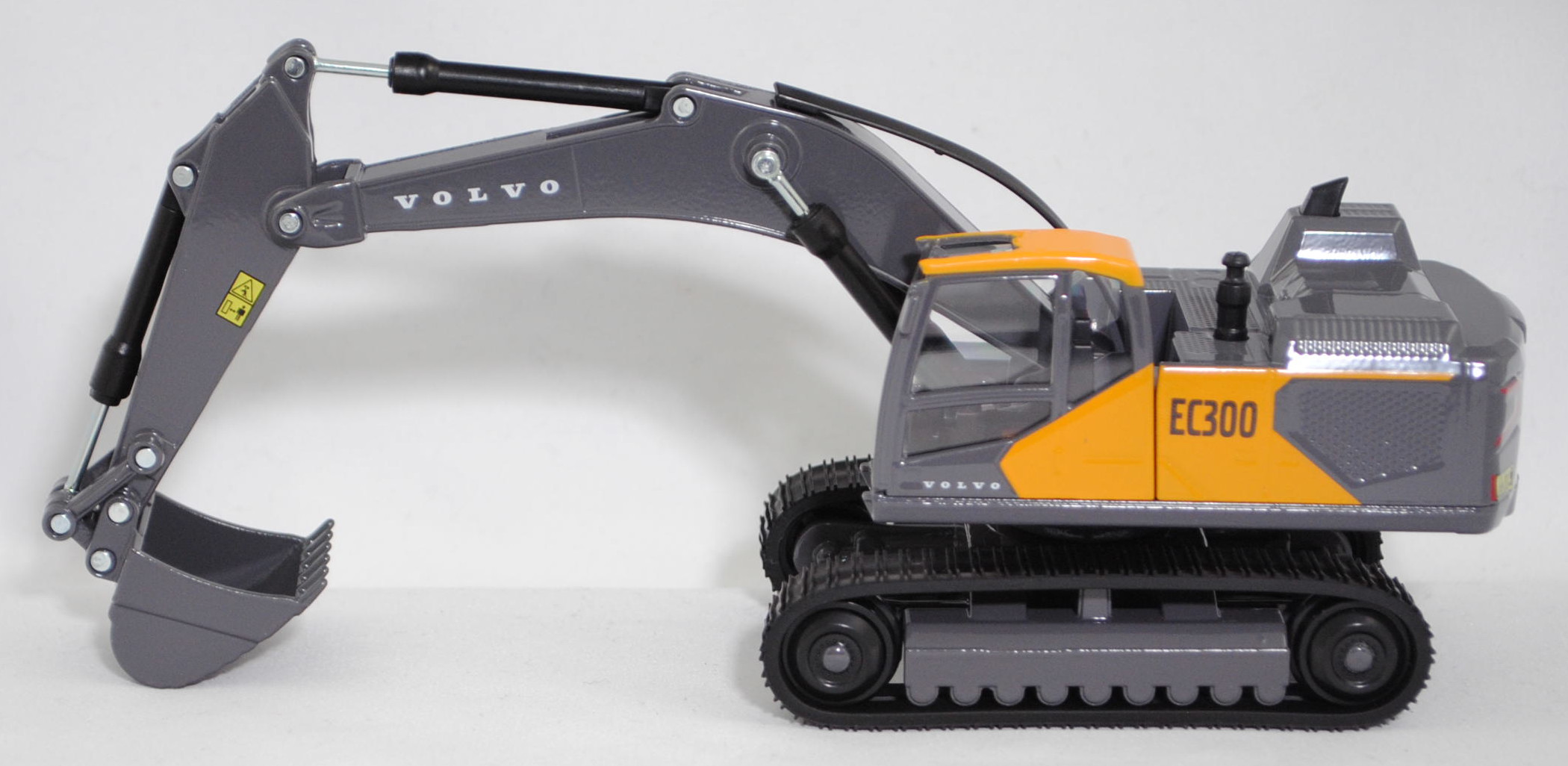 00000 Hydraulikbagger Volvo EC300 mit Tieflöffel und Raupenfahrwerk, maisgelb/blass-graubraun, Sitz schwarz, SIKU SUPER 1:50, L17mpK