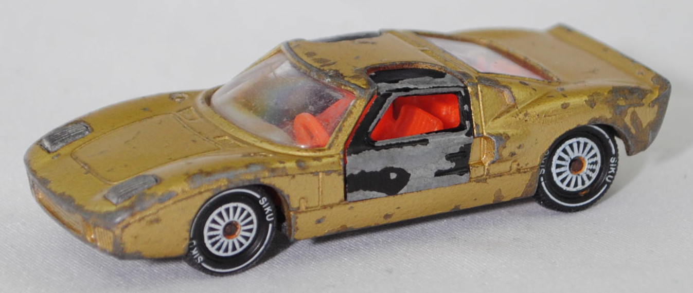 00005 Ford GT40 (Mk I bzw. Mark 1, Modell 1965-1967), Karosserie goldmetallic, Türen schwarz, Bpr. V 296 / W-Germ, Verglasung klar, R11 gerillt, SIKU SUPER, 1:57, vsc